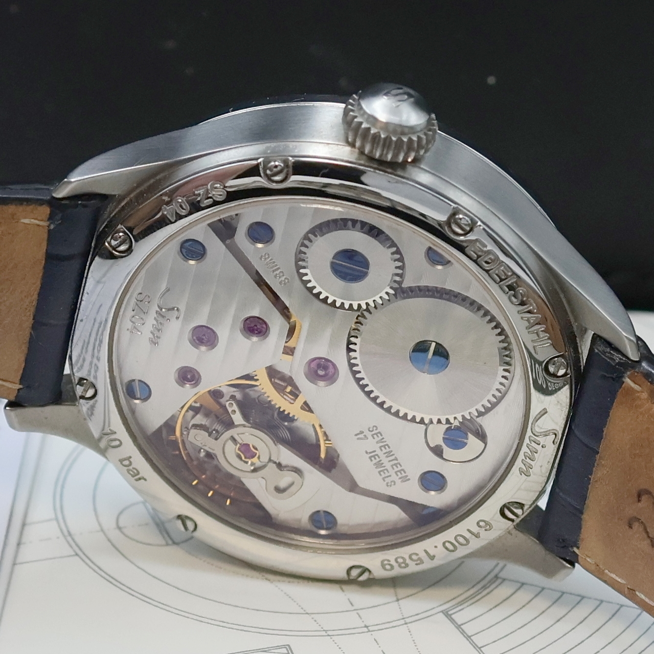 Detail d: SINN Herrenarmbanduhr Regulateur Referenz 6100, Schweiz um 2011, beids. vergl. Edelstahlgeh. inkl. orig. Lederband m. dopp. Faltschl., Saphirgl., ...