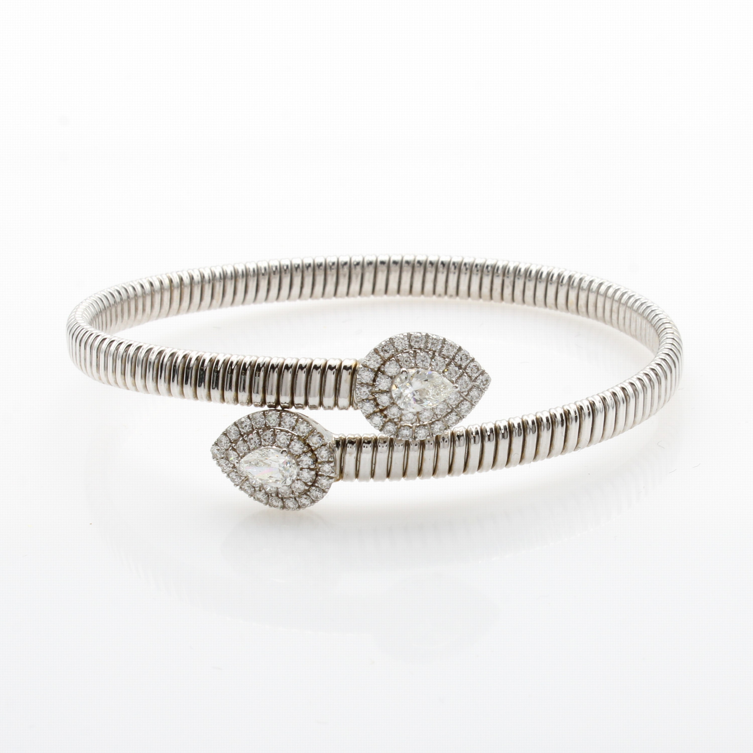Image 27034145 - Armreif mit Diamanten und Brillanten, WG 750/000, 2 Diamanttropfen zus. ca. 0.77 ct, ...