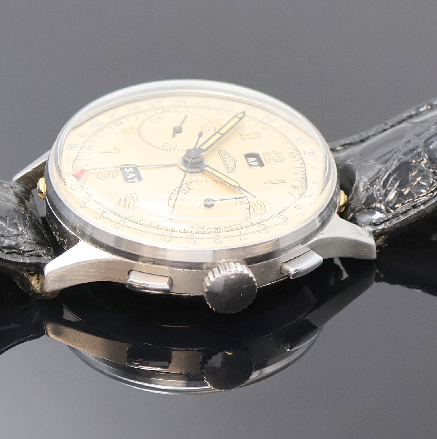 Detail b: ANGELUS Schaltradchronograph Chronodato, Schweiz 1940er Jahre, Handaufzug, unsign. Edelstahlgeh., Boden und Glasrand aufgedr., vers. Zifferblatt ...