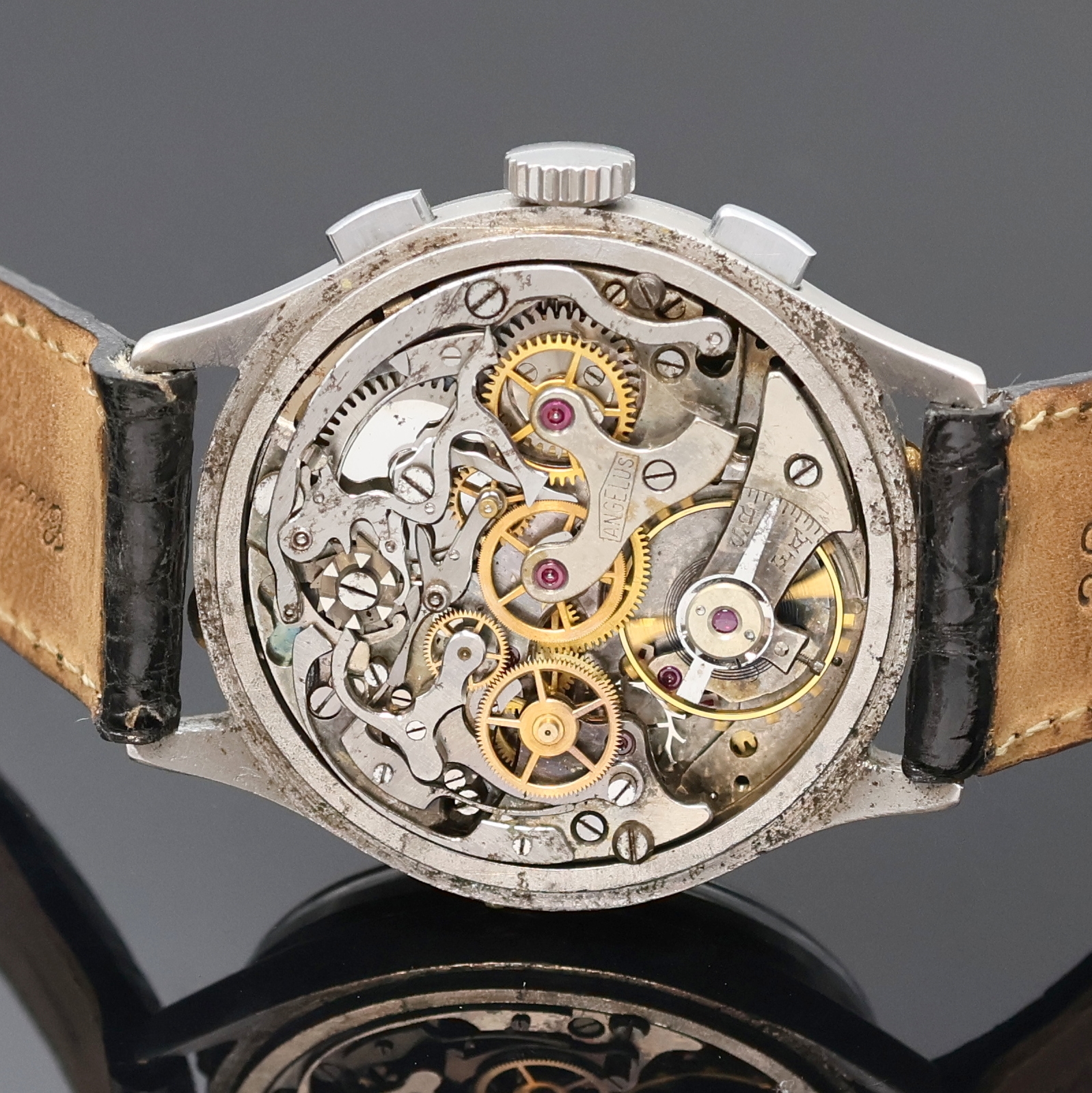 Detail e: ANGELUS Schaltradchronograph Chronodato, Schweiz 1940er Jahre, Handaufzug, unsign. Edelstahlgeh., Boden und Glasrand aufgedr., vers. Zifferblatt ...