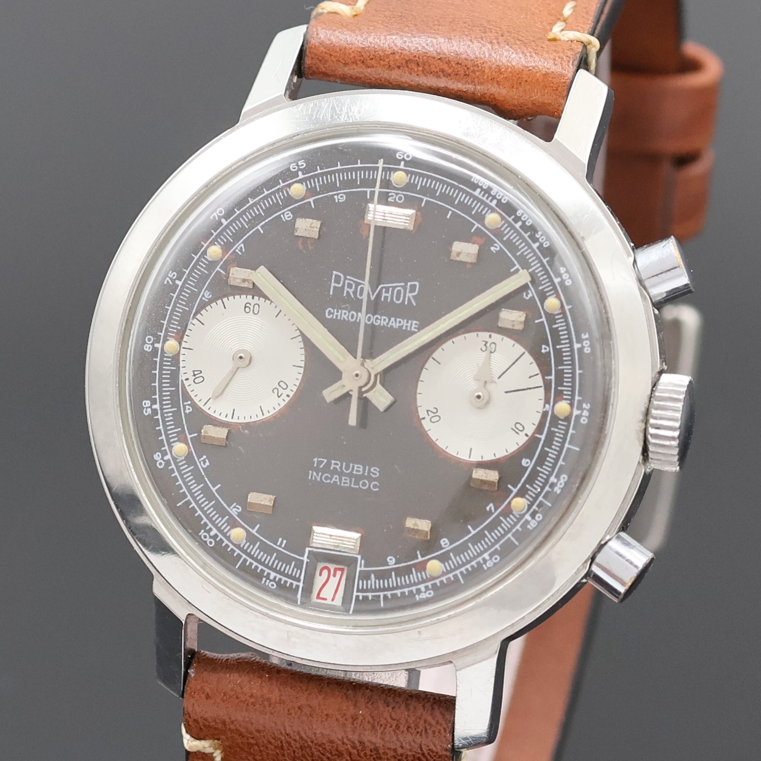 Detail a: PROVHOR Armbandchronograph in Stahl, Schweiz um 1968, Handaufzug, Boden verschr., graues Zifferbl. m. aufges. Std.-Ind. altersbed. fl./pat., silb. ...