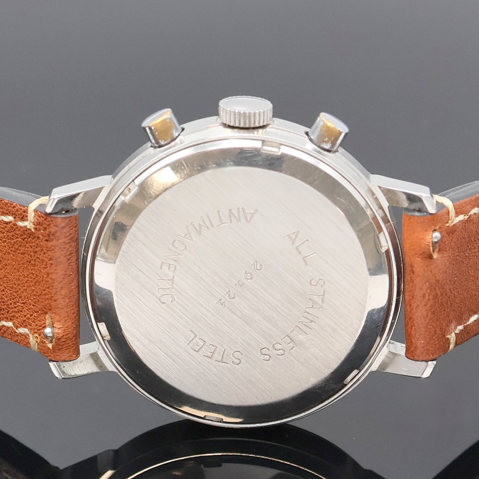 Detail c: PROVHOR Armbandchronograph in Stahl, Schweiz um 1968, Handaufzug, Boden verschr., graues Zifferbl. m. aufges. Std.-Ind. altersbed. fl./pat., silb. ...
