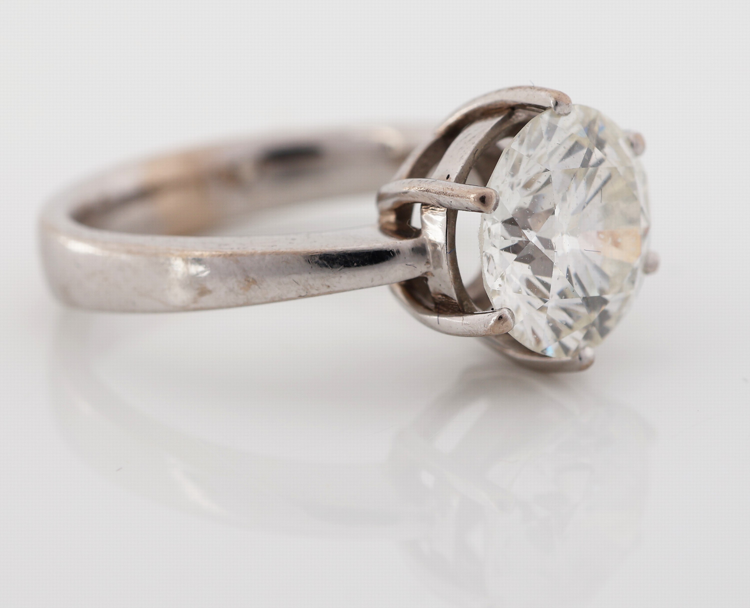 Detail b: 18 kt Gold Brillant-Ring, WG 750/000, Brillant ca. 3.0 ct l.get.Weiß/vs-si, RW 56, ca. 6.7 g