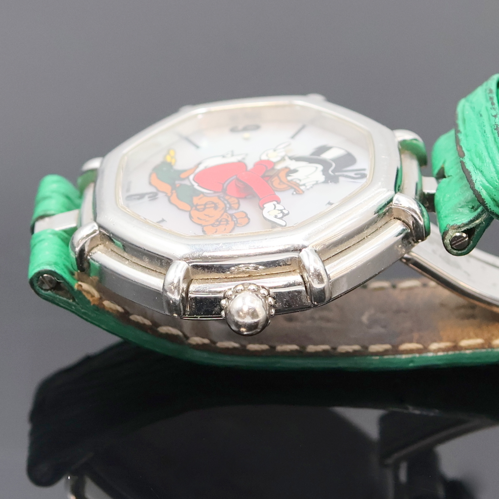Detail c: GERALD GENTA Disney Armbanduhr Referenz G.3487.7, Schweiz 1990er Jahre, Automatik, Edelstahlgeh. inkl. neutr. Lederband m. Faltschl., Boden 8-fach ...