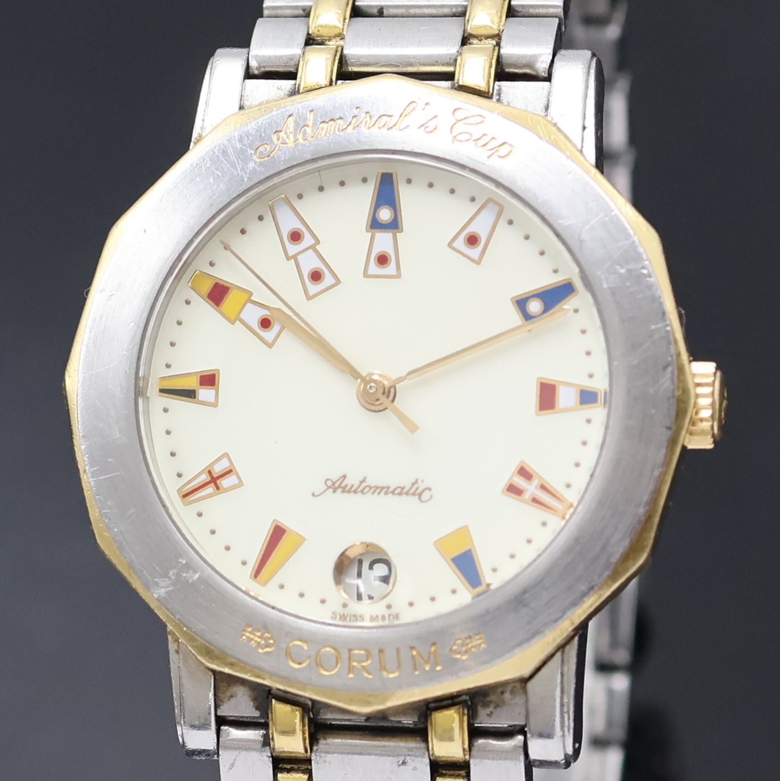 Detail a: CORUM Admiral's Cup Herrenarmbanduhr Referenz 89.430.21, Schweiz um 1990, Automatik, Edelstahl/Gold komb., Boden 4-fach verschr., orig. ...