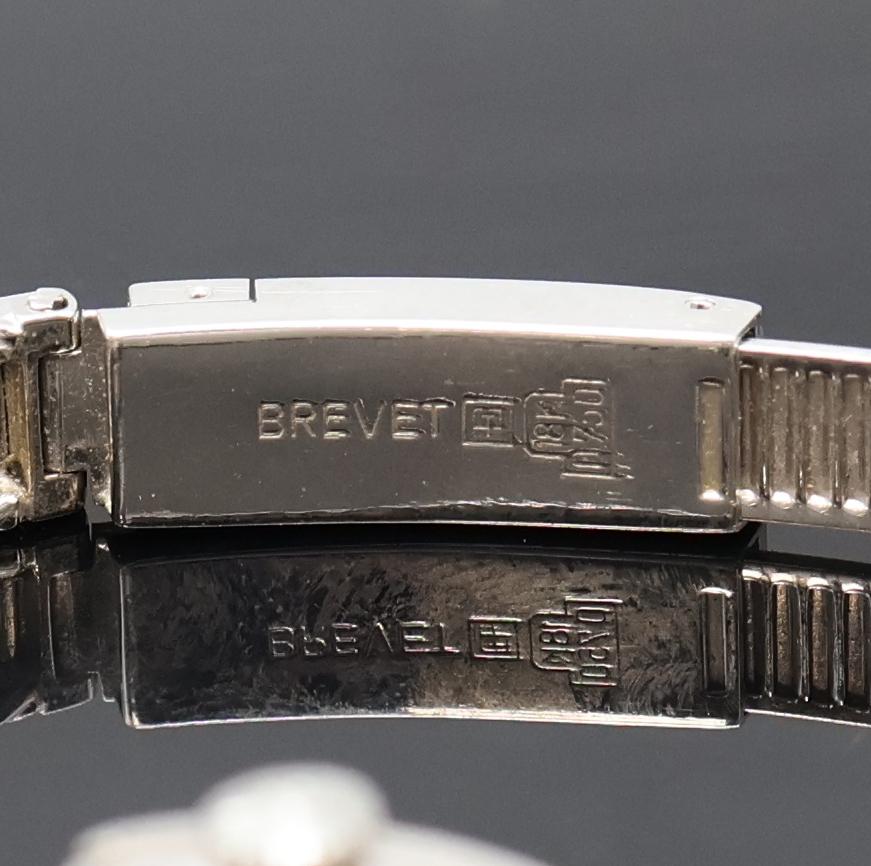 Detail d: Damenarmbanduhr bezeichnet Movado in WG 750/000 mit Diamanten, Handaufzug, Schweiz um 1970, silb. Zifferbl. m. aufgel. Indizes, Formankerw., 17 St., ...
