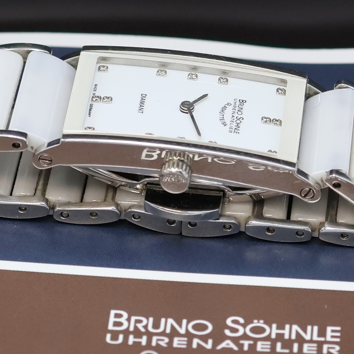 Detail d: BRUNO SÖHNLE Thalia 2 Damenarmbanduhr Referenz 3099, Deutschland verk. lt. beil. Pap. 07/2013, quarz, Edelstahlgeh. inkl. orig. Keramikband m. dopp. ...