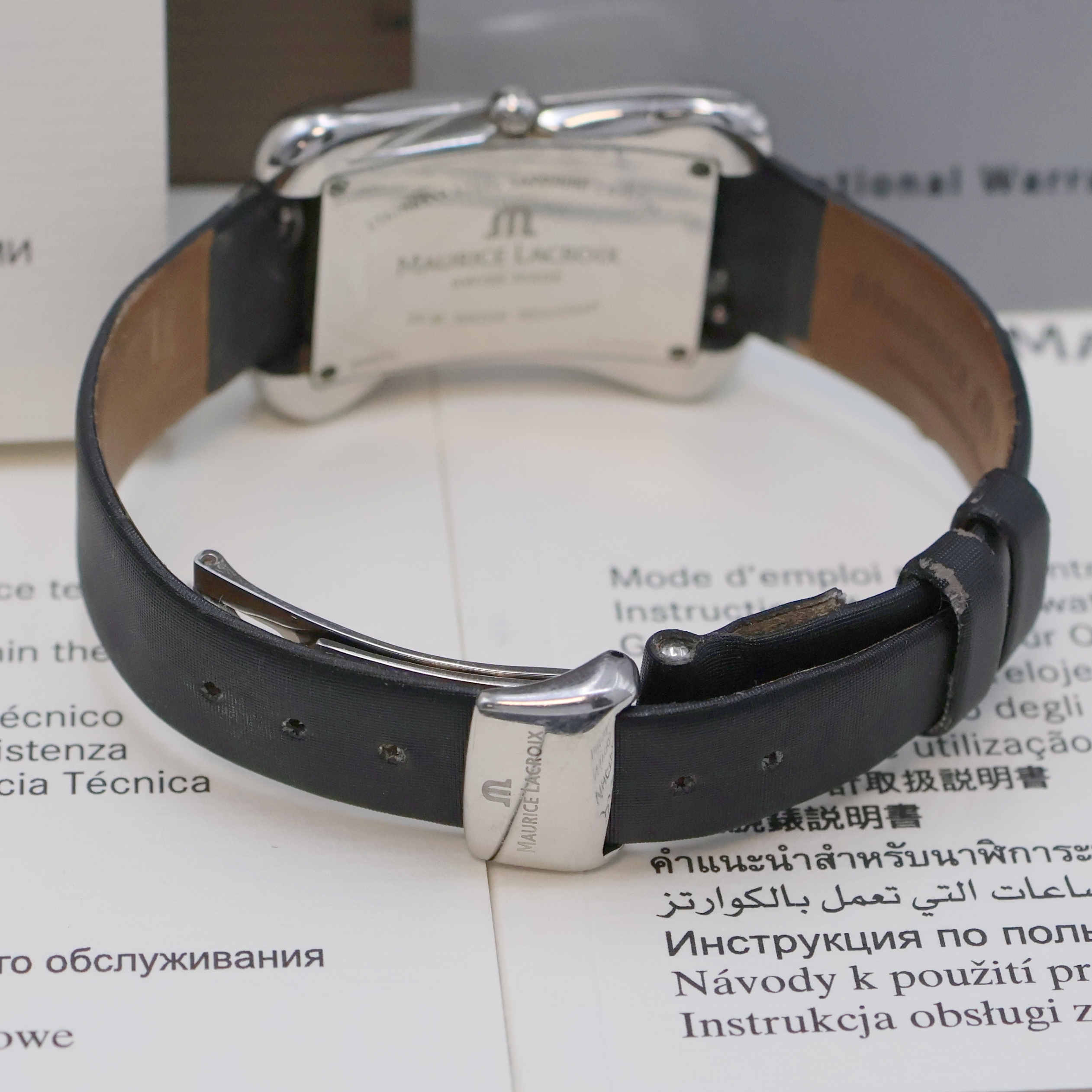 Detail c: MAURICE LACROIX Divina Armbanduhr Referenz DV5012, Schweiz um 2000, quarz, Edelstahlgeh. inkl. orig. Lederband m. Faltschl., Boden 4-fach verschr. ...