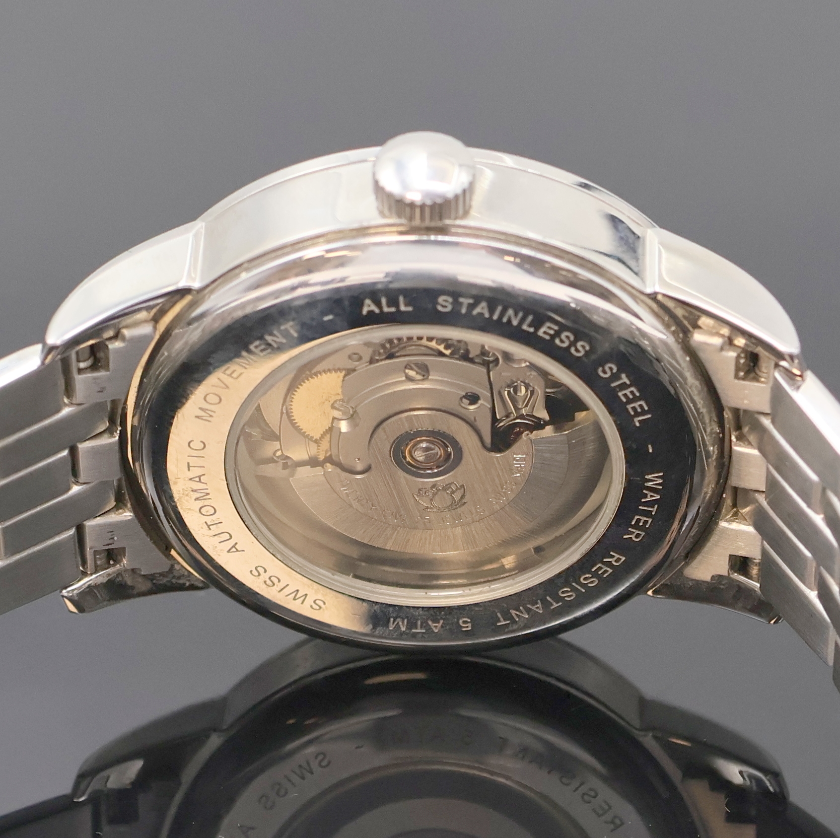 Detail e: MALYSIAK Herrenarmbanduhr in Stahl, Schweiz/Deutschland um 2010, Automatik, beids. vergl. Geh. inkl. Gliederband m. dopp. Faltschl., silb. Zifferbl. ...