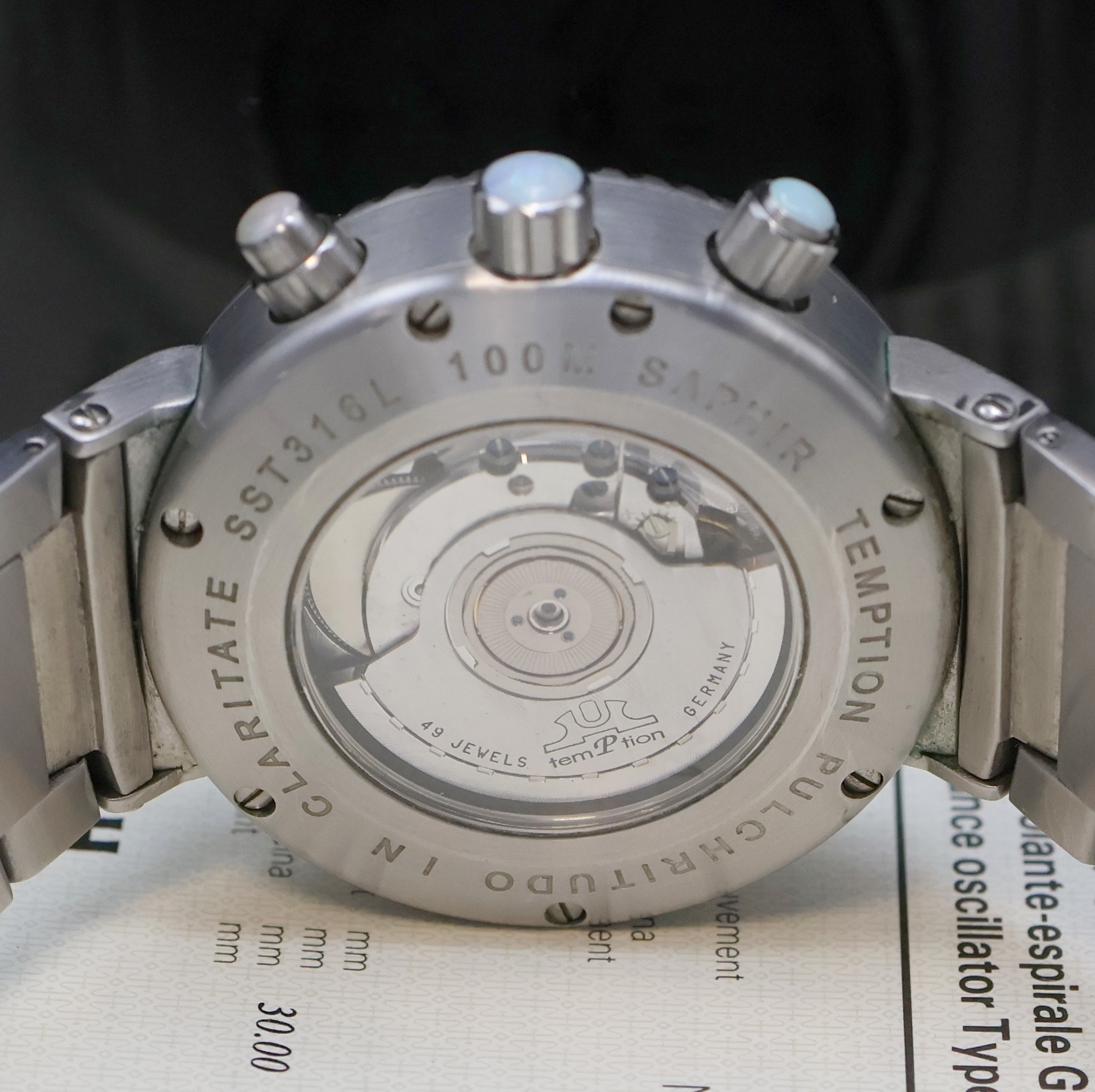 Detail e: TEMPTION Cherubin-GDA auf 500 Stück limitierter Armbandchronograph in Stahl, Deutschland um 1995, Automatik, beids. vergl. Geh. inkl. orig. ...