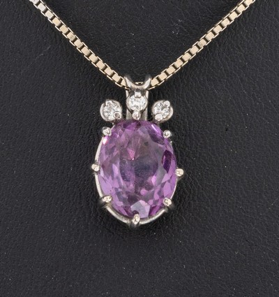 27034793a - 14 kt Gold Amethyst-Brillant-Anhänger, WG 585/000 gepr., ovalfacett. Amethyst ca. 3.40 ...