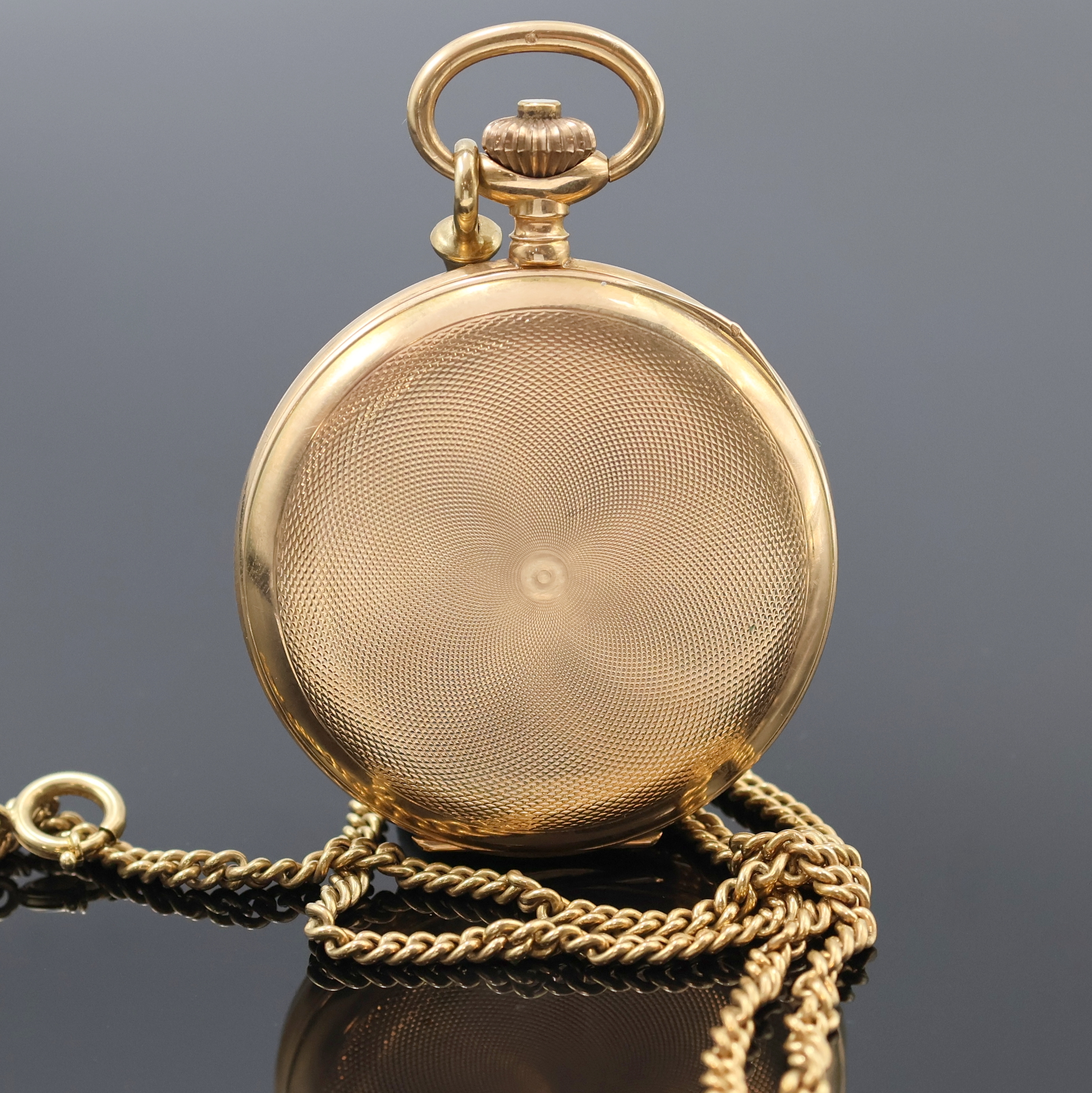 Detail b: SUPRA Chronometer Savonette in RG 585/000 mit Kette in RG 375/000, Schweiz um 1910, guill. Sprung- u. Rückdeckel, Geh. dell., Metallcuvette, ...