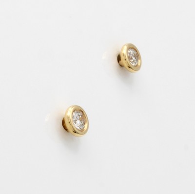 27035057a - Paar Ohrstecker mit Brillantsolitären, GG 585/000, 2 Brill. in Zargenfassungen zus. ca. ...