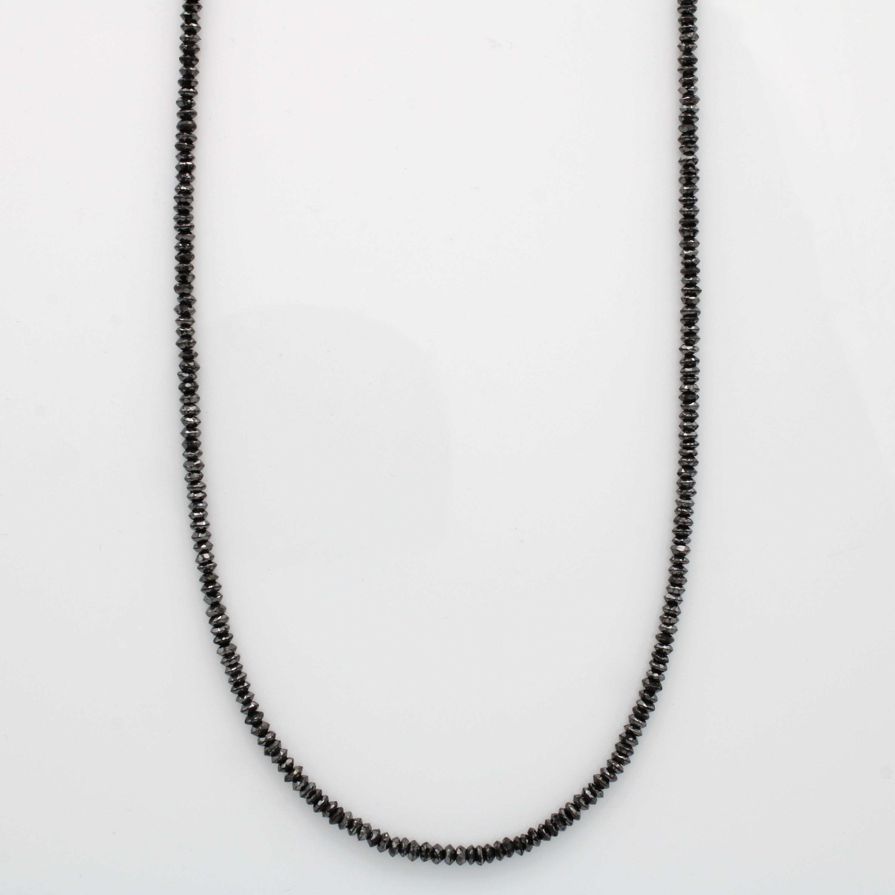 Image 27035412 - Diamantstrang, schwarze, fac. Diamantlinsen (beh.) zus. ca. 30.35 ct, L. ca. 43 cm ...