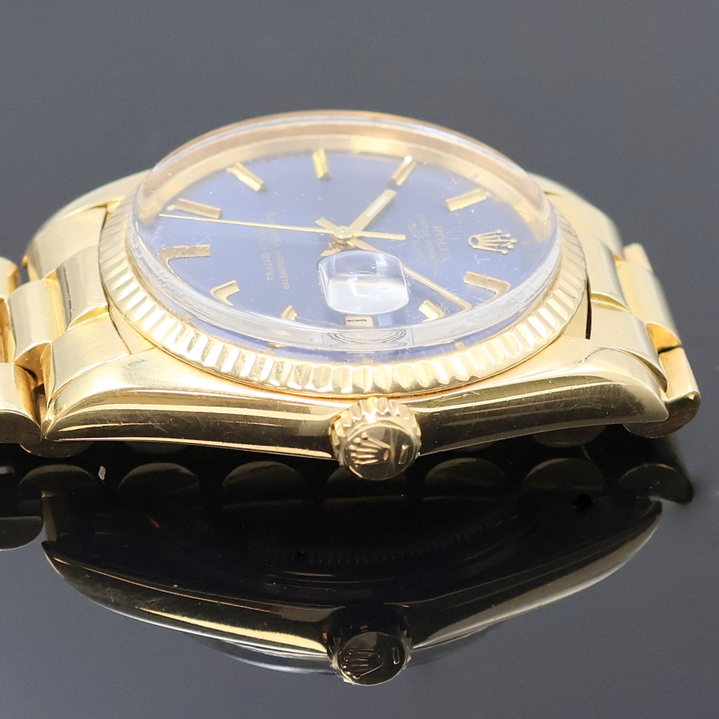 Detail d: ROLEX Datejust Herrenarmbanduhr am Präsidentband in GG 750/000 Referenz 1601, Schweiz um 1973, Automatik, verschr. Oystergeh., geriffelte Lünette, ...
