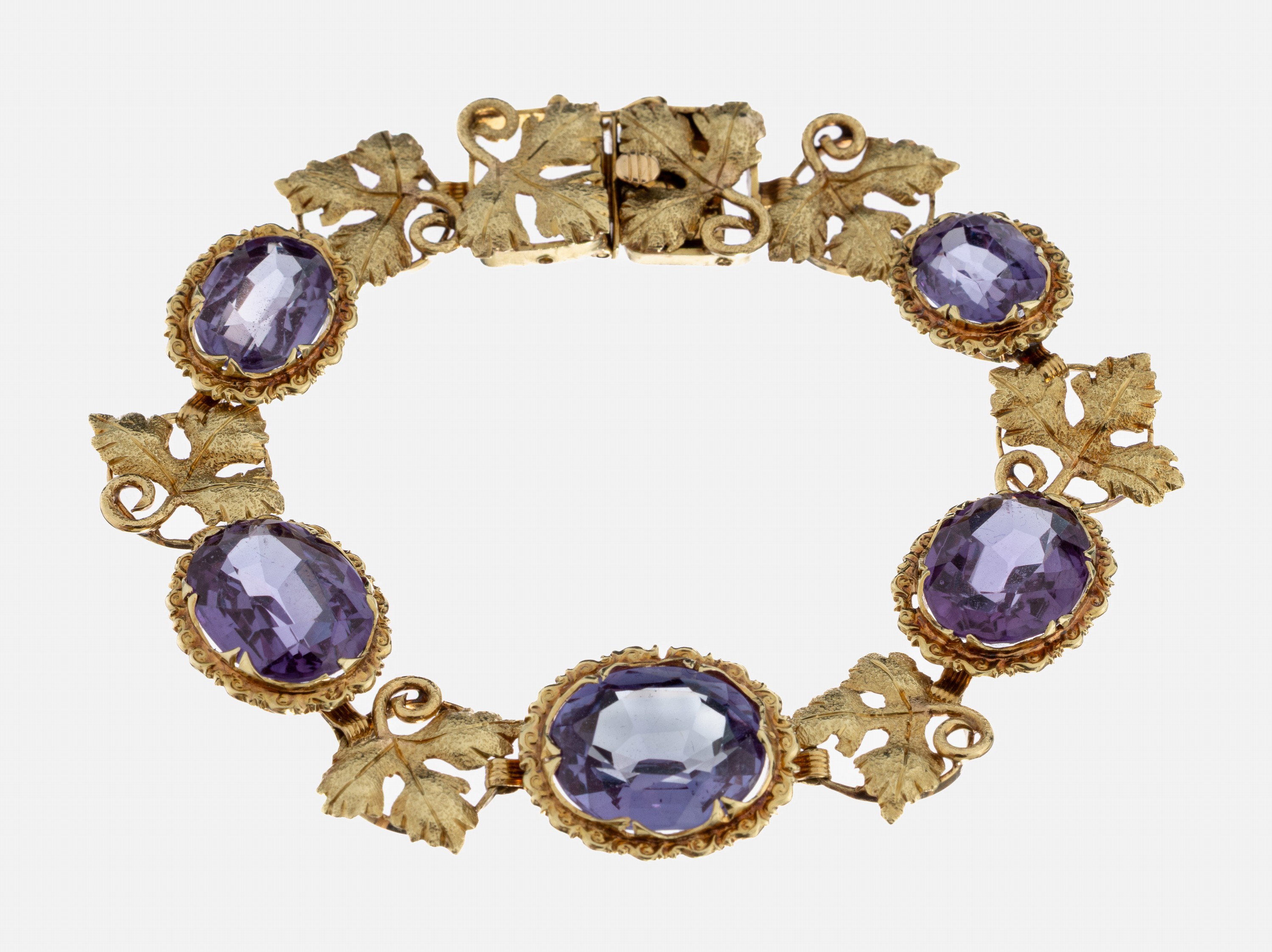 Detail a: 14 kt Gold Farbstein-Armband, 1960er Jahre, GG 585/000, 5 ovalfacett. synth. Korunde, Zwischenglieder mit Weinlaubdekor, L. ca. 18 cm, Kastenschloss ...