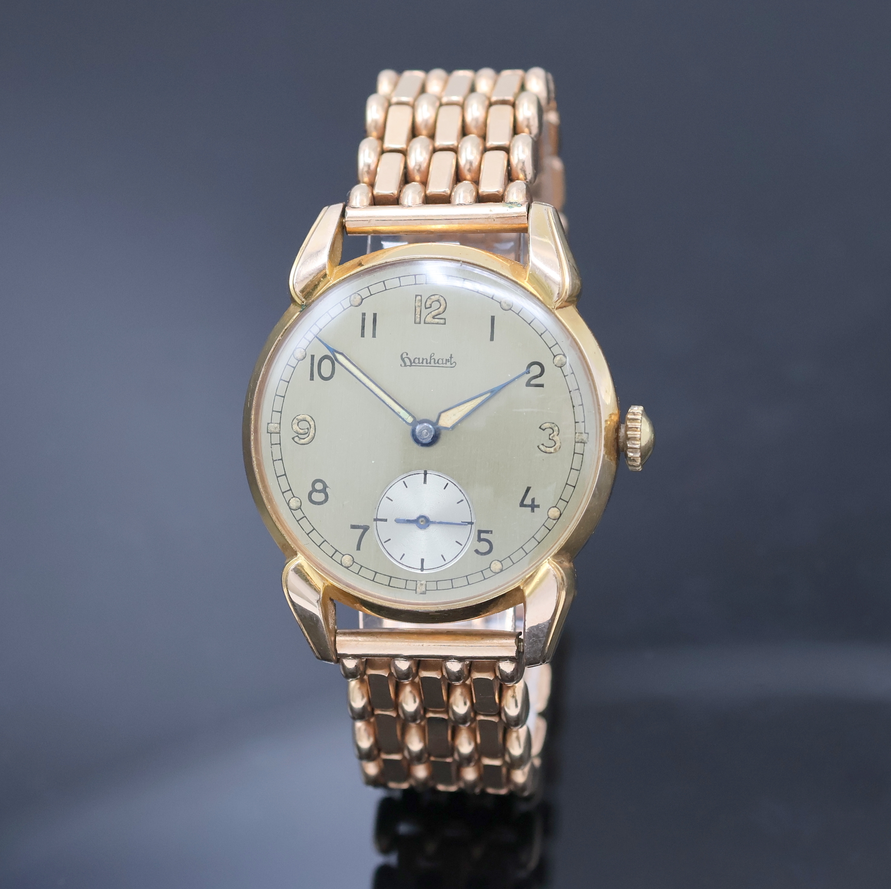 Image 27036522 - HANHART rot-vergoldete Herrenarmbanduhr, Deutschland um 1940, Handaufzug, 2-tlg. Geh., ...