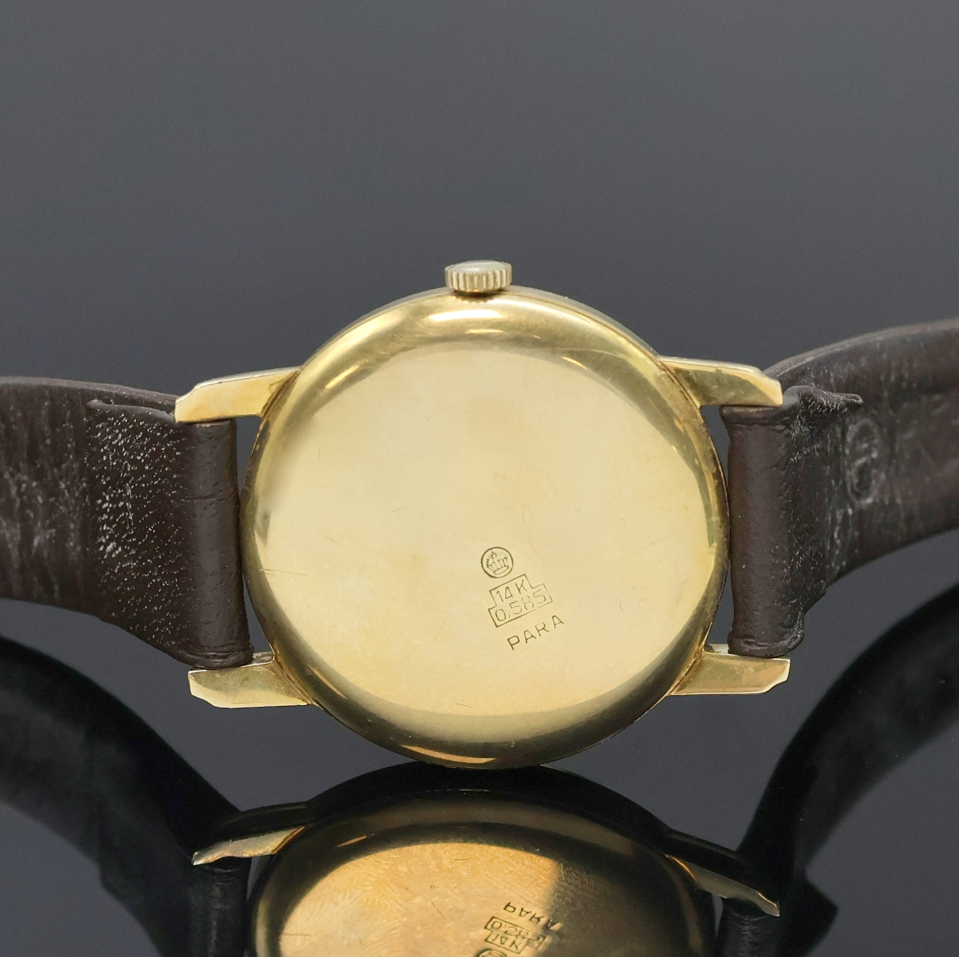 Detail c: PARA Klasse Armbanduhr in GG 585/000, Schweiz um 1965, Handaufzug, Boden aufgedr., silb. Zifferbl. fl./pat., gold. arab. Zahlen, Std.- Ind. u. ...