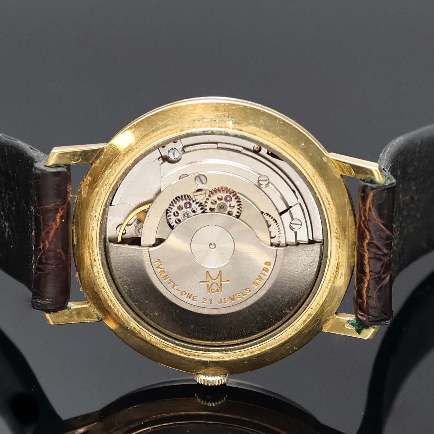 Detail e: ZENTRA Savoy Armbanduhr in GG 585/000, Schweiz um 1960, Automatik, Boden u. Glasrand aufgedr., gold. Zifferbl. m. aufges. Std.- Ind., gold. Zeiger, ...