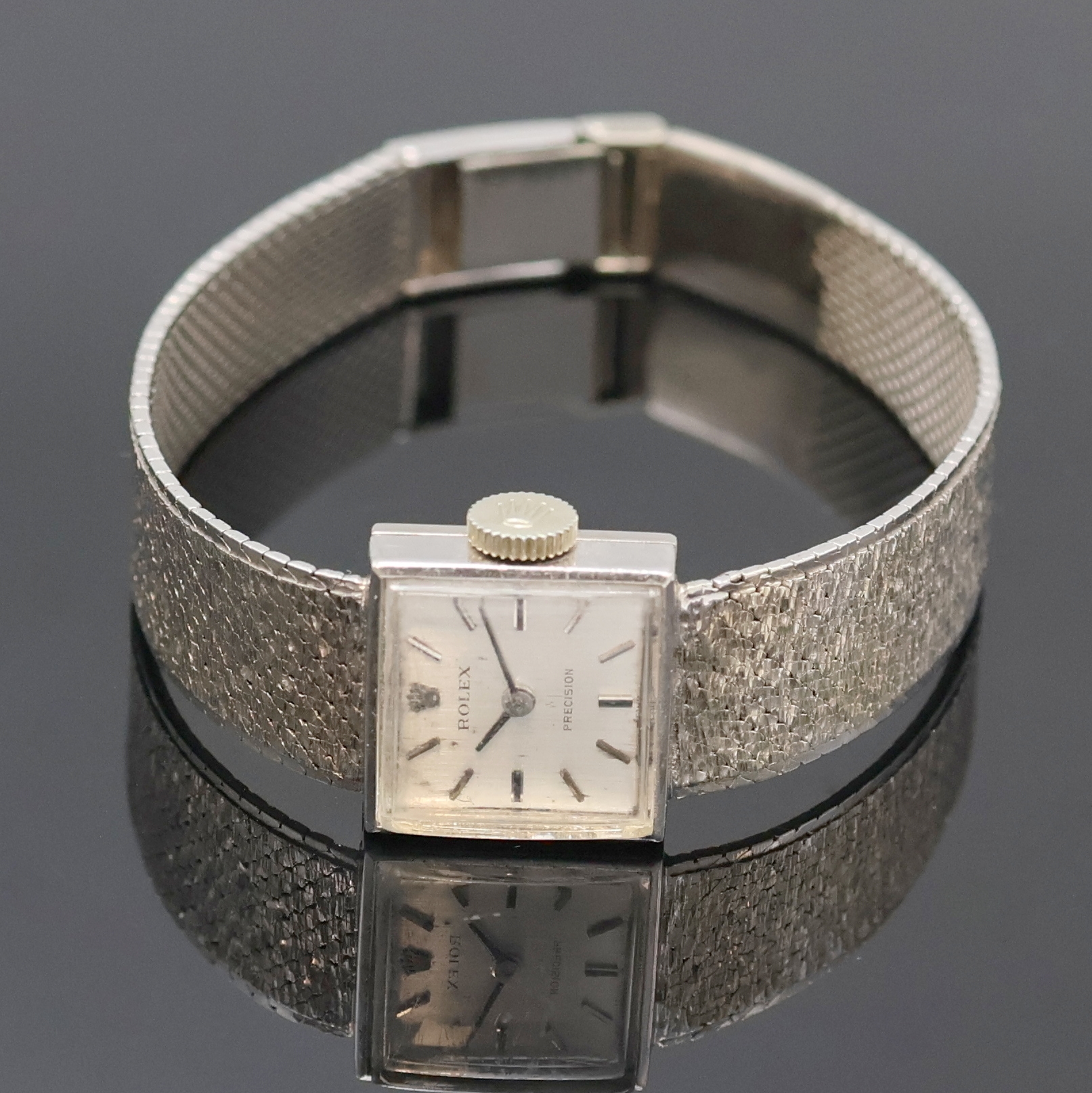 ROLEX Precision Damenarmbanduhr in WG 750/000, Schweiz 1960er Jahre, Handaufzug, Bucherer Goldband, Boden aufgedr., silb. Zifferbl. m. aufges. ...