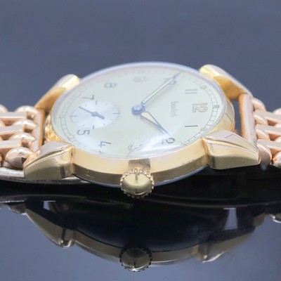 27036522e - HANHART rot-vergoldete Herrenarmbanduhr, Deutschland um 1940, Handaufzug, 2-tlg. Geh., ...