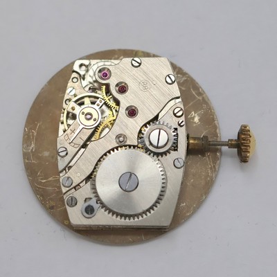 27036522g - HANHART rot-vergoldete Herrenarmbanduhr, Deutschland um 1940, Handaufzug, 2-tlg. Geh., ...