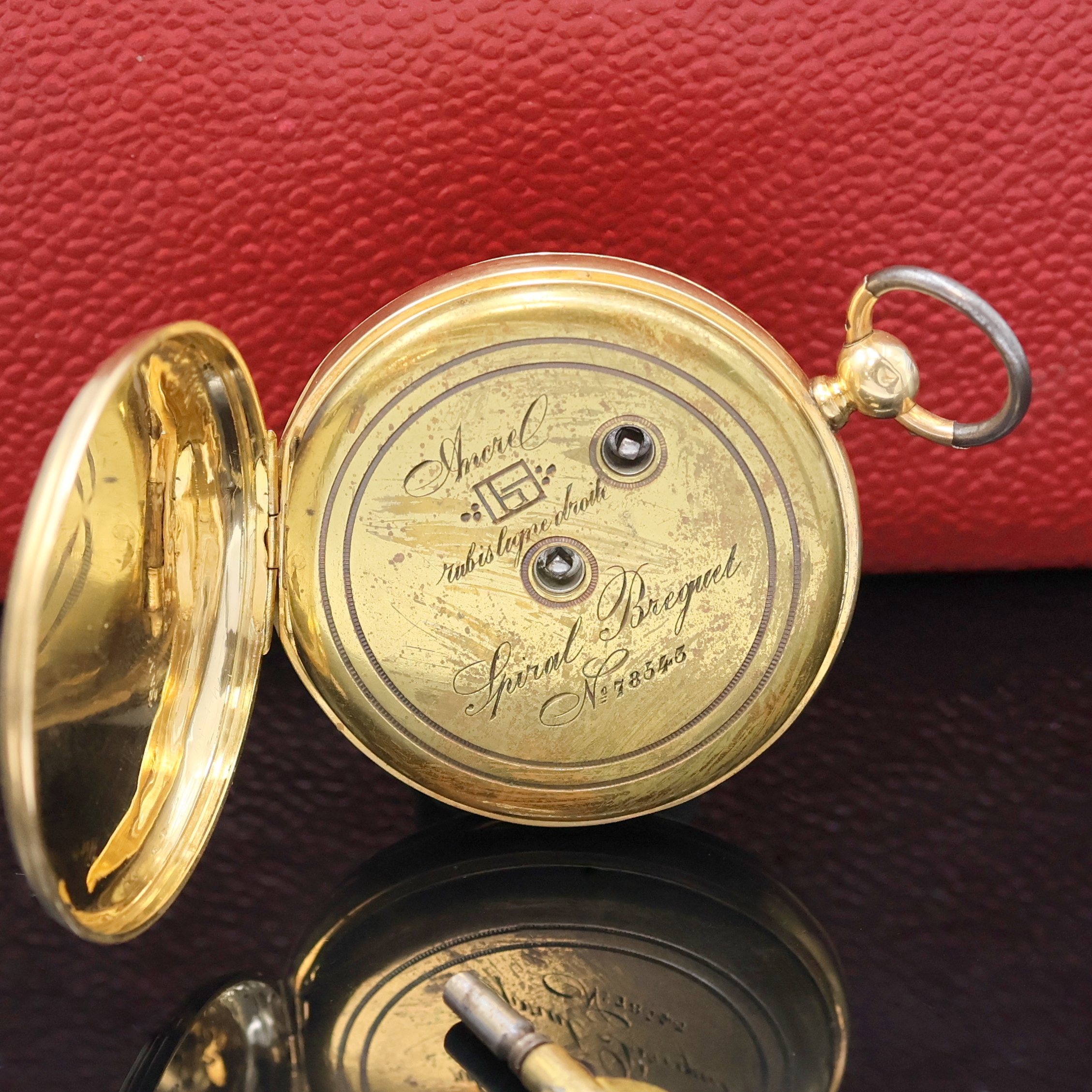 Detail b: Offene Herrentaschenuhr in GG 750/000 mit Schlüsselaufzug, Schweiz um 1860, guill. Geh. dell., Metall Cuvette, Emailzifferbl., röm. Zahlen, kl. ...