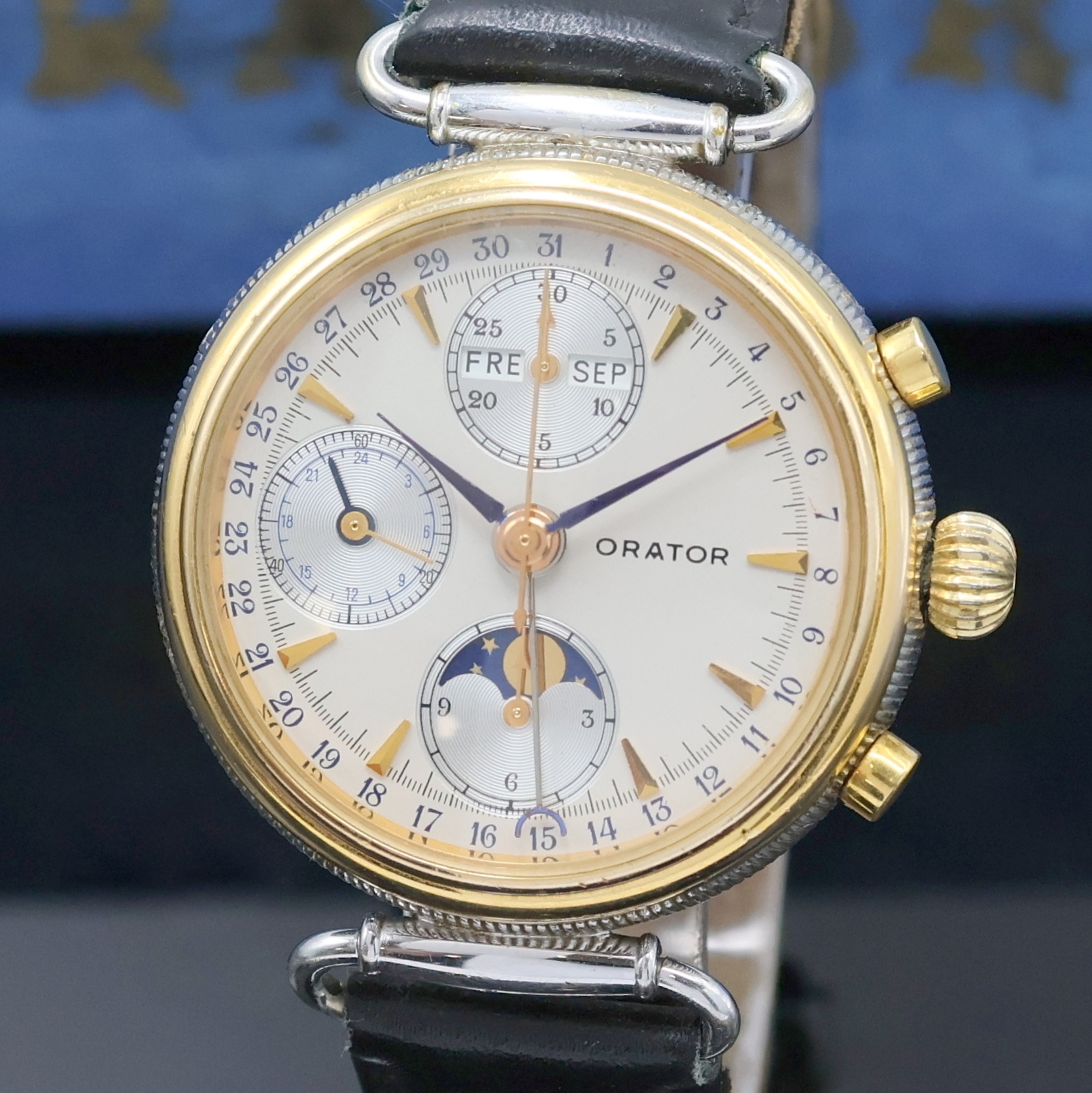 Detail a: ORATOR schöner Herrenchronograph in 2-farbig vergoldetem Gehäuse mit Vollkalender, Schweiz um 1990, Automatik, beids. vergl. Geh. m. bewegl. ...
