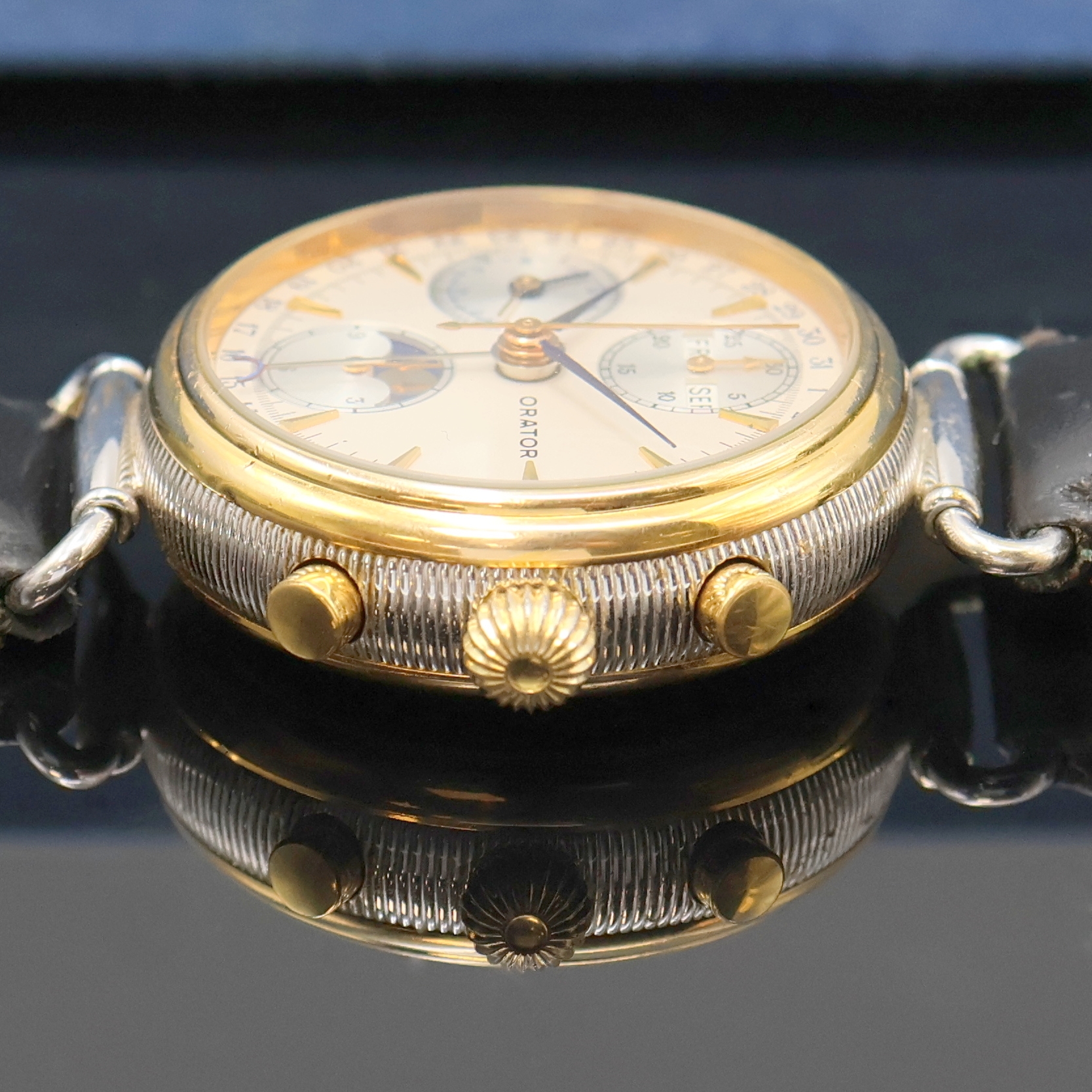 Detail c: ORATOR schöner Herrenchronograph in 2-farbig vergoldetem Gehäuse mit Vollkalender, Schweiz um 1990, Automatik, beids. vergl. Geh. m. bewegl. ...