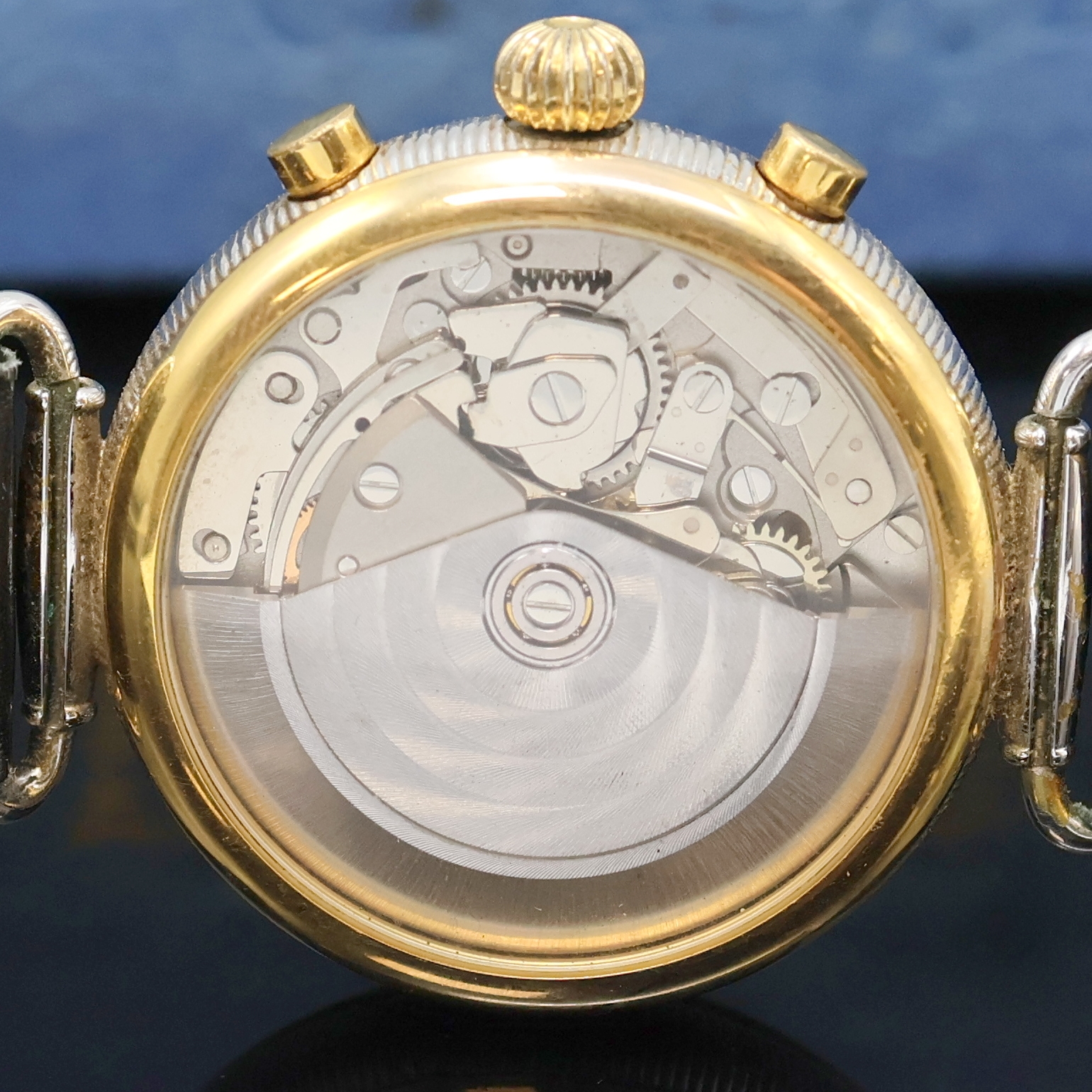 Detail d: ORATOR schöner Herrenchronograph in 2-farbig vergoldetem Gehäuse mit Vollkalender, Schweiz um 1990, Automatik, beids. vergl. Geh. m. bewegl. ...