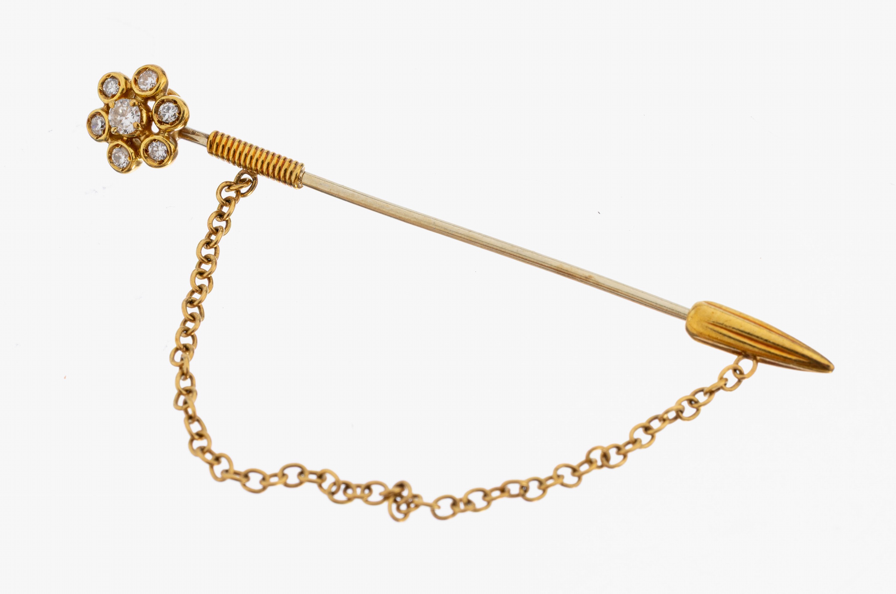 18 kt Gold Brillant-Brosche, GG/WG 750/000,außergewöhnliche Gestaltung, blütenf. Kopf mit7 Brillanten zus. ca. 0.11 ct Weiß/si, ca. 3.2g