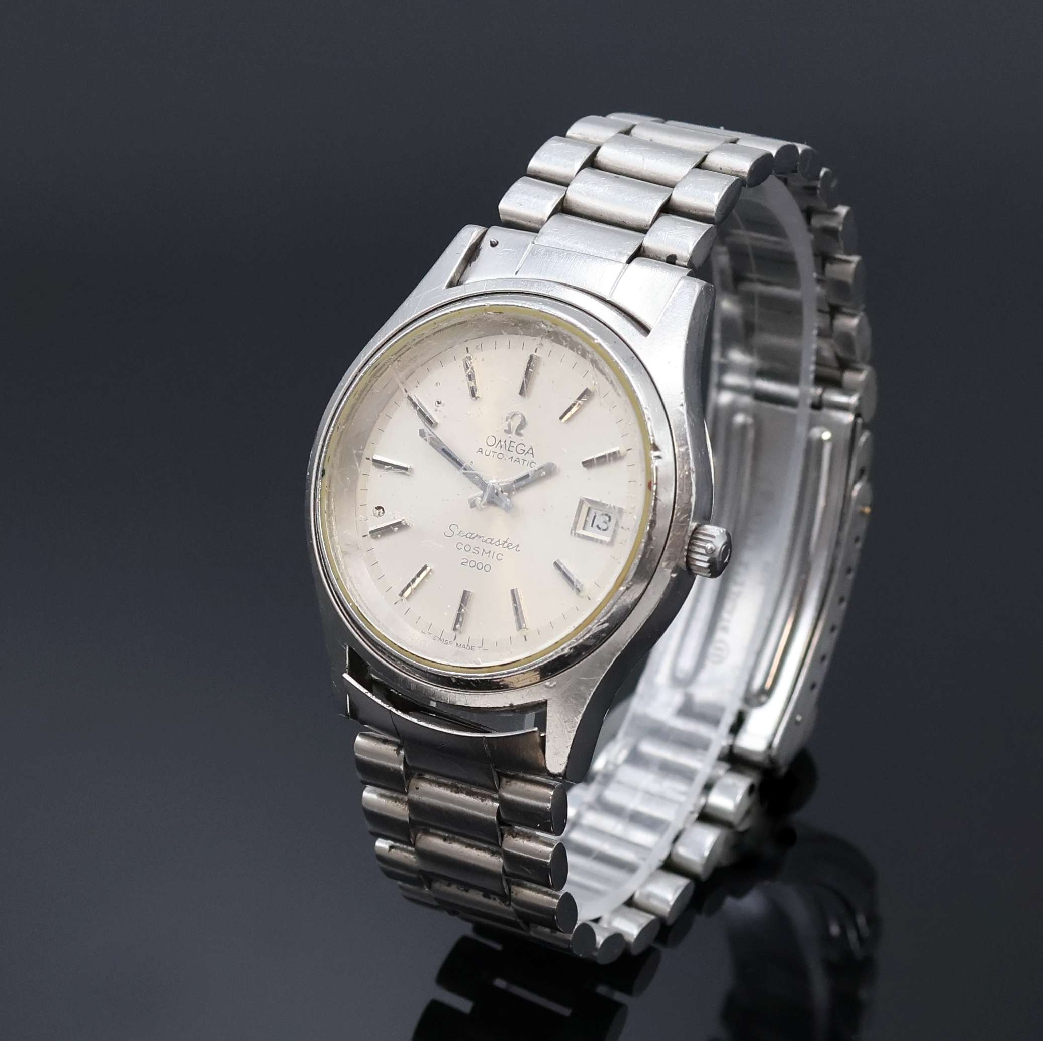 Detail a: OMEGA Herrenarmbanduhr Seamaster Cosmic 2000 in Stahl, Schweiz um 1970, Automatik, Stülpgeh. inkl. orig. Gliederband m. Faltschl., vers. Zifferbl. ...