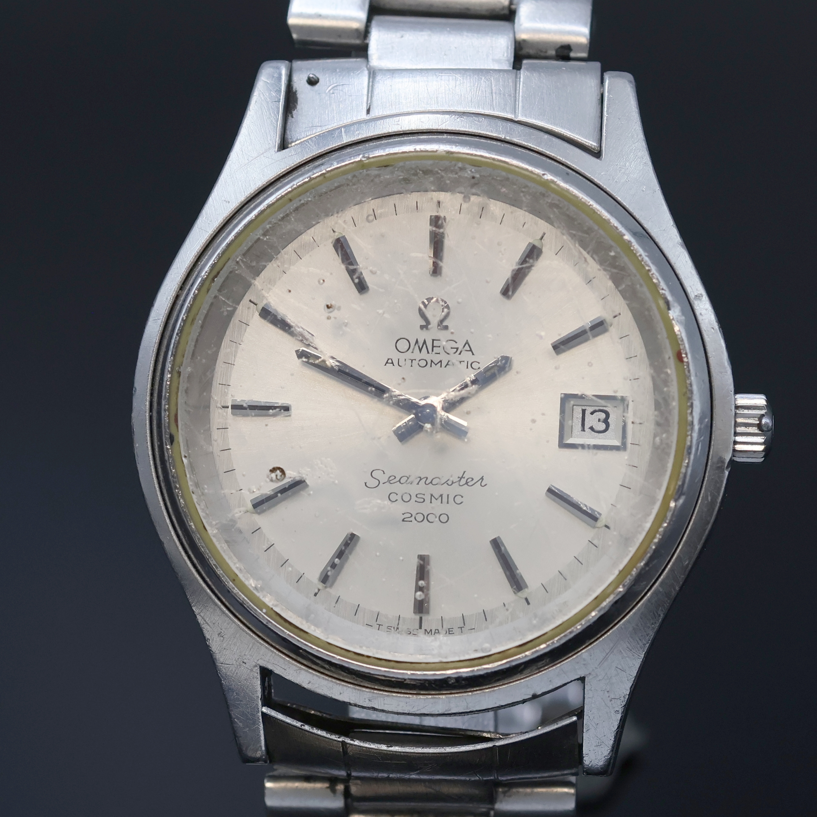 Detail b: OMEGA Herrenarmbanduhr Seamaster Cosmic 2000 in Stahl, Schweiz um 1970, Automatik, Stülpgeh. inkl. orig. Gliederband m. Faltschl., vers. Zifferbl. ...