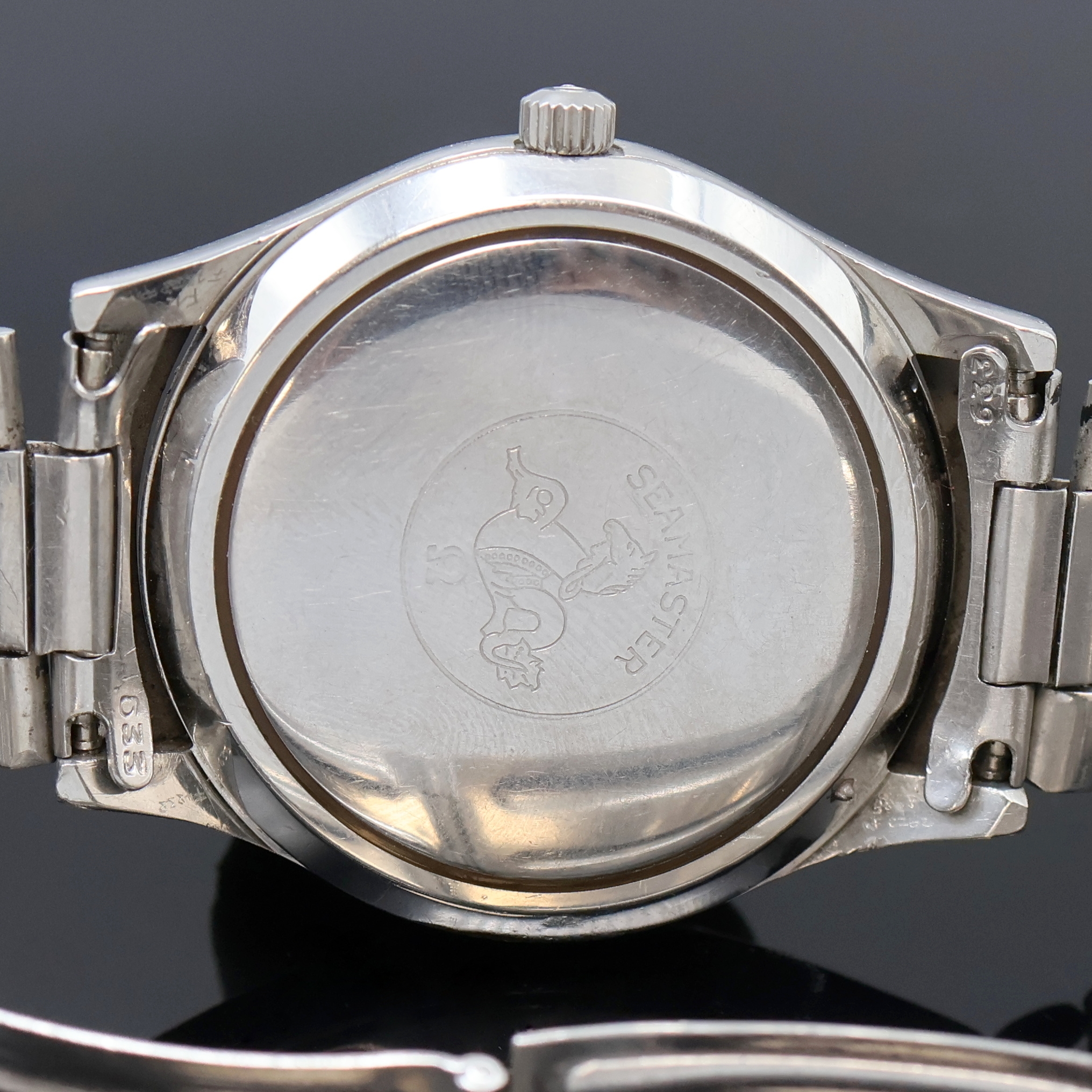 Detail f: OMEGA Herrenarmbanduhr Seamaster Cosmic 2000 in Stahl, Schweiz um 1970, Automatik, Stülpgeh. inkl. orig. Gliederband m. Faltschl., vers. Zifferbl. ...