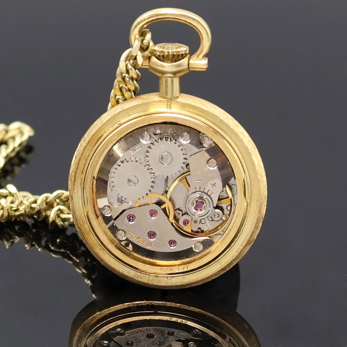 Detail b: ULLMANN Geneve kleine, offene Damenanhängeuhr in GG 585/000 an Kette in GG 585/000, Schweiz um 1970, 2-teil. Struktur-Geh., aufgedr. Boden m. ...