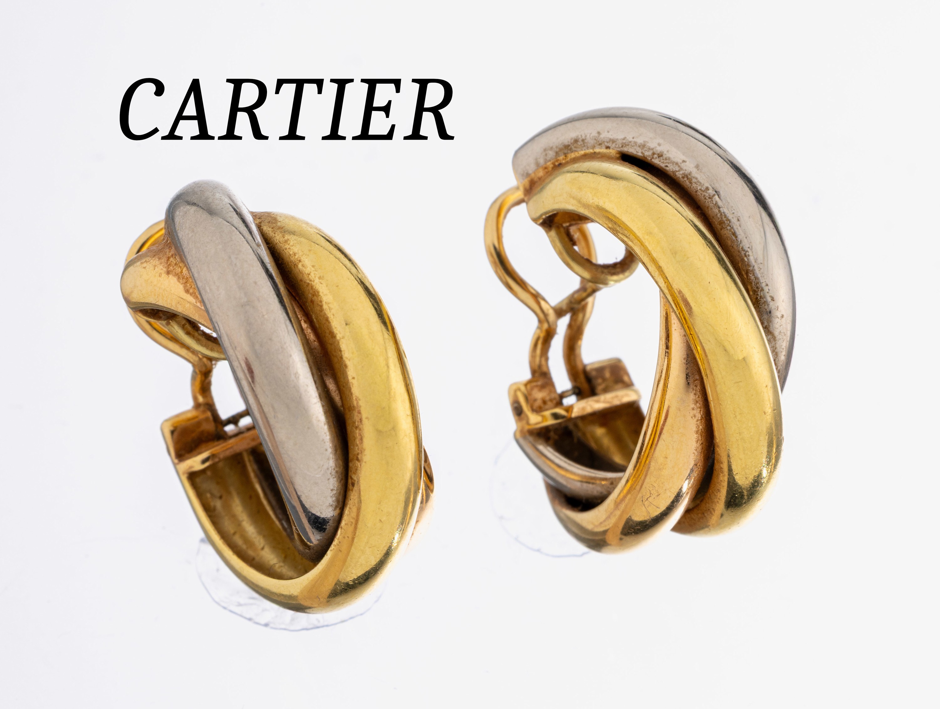 Image 27037674 - Paar 18 kt Gold CARTIER Ohrstecker, GG/WG 750/000, Model Mahe, D. ca. 2.5 cm, ...