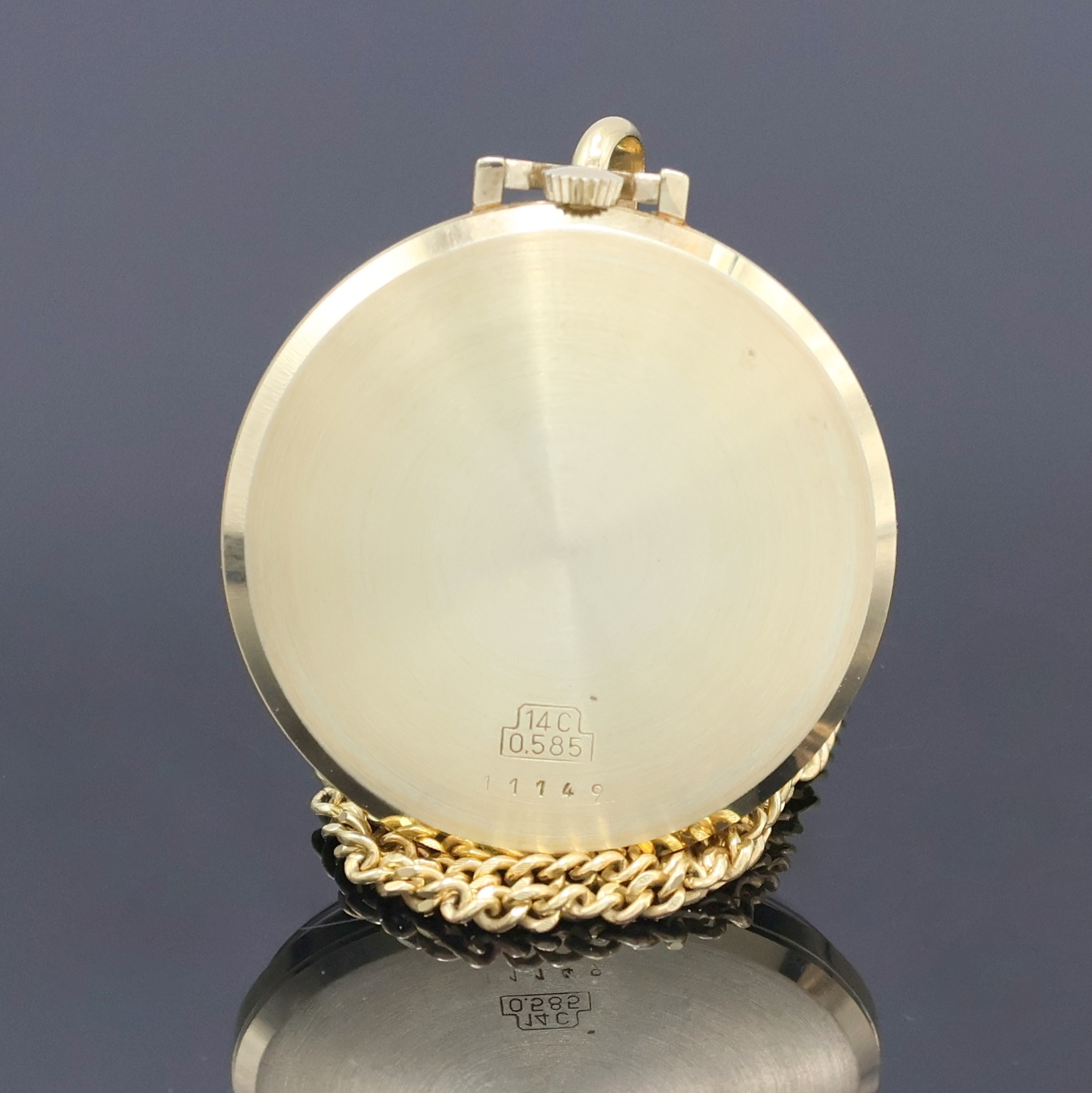 Detail a: TASSO Frackuhr in GG 585/000 mit Kette in GG 333/000, Schweiz um 1970, Handaufzug, Glasrand aufgedr., silb. Zifferbl. m. gold. Std.-Ind. u. Zeigern, ...