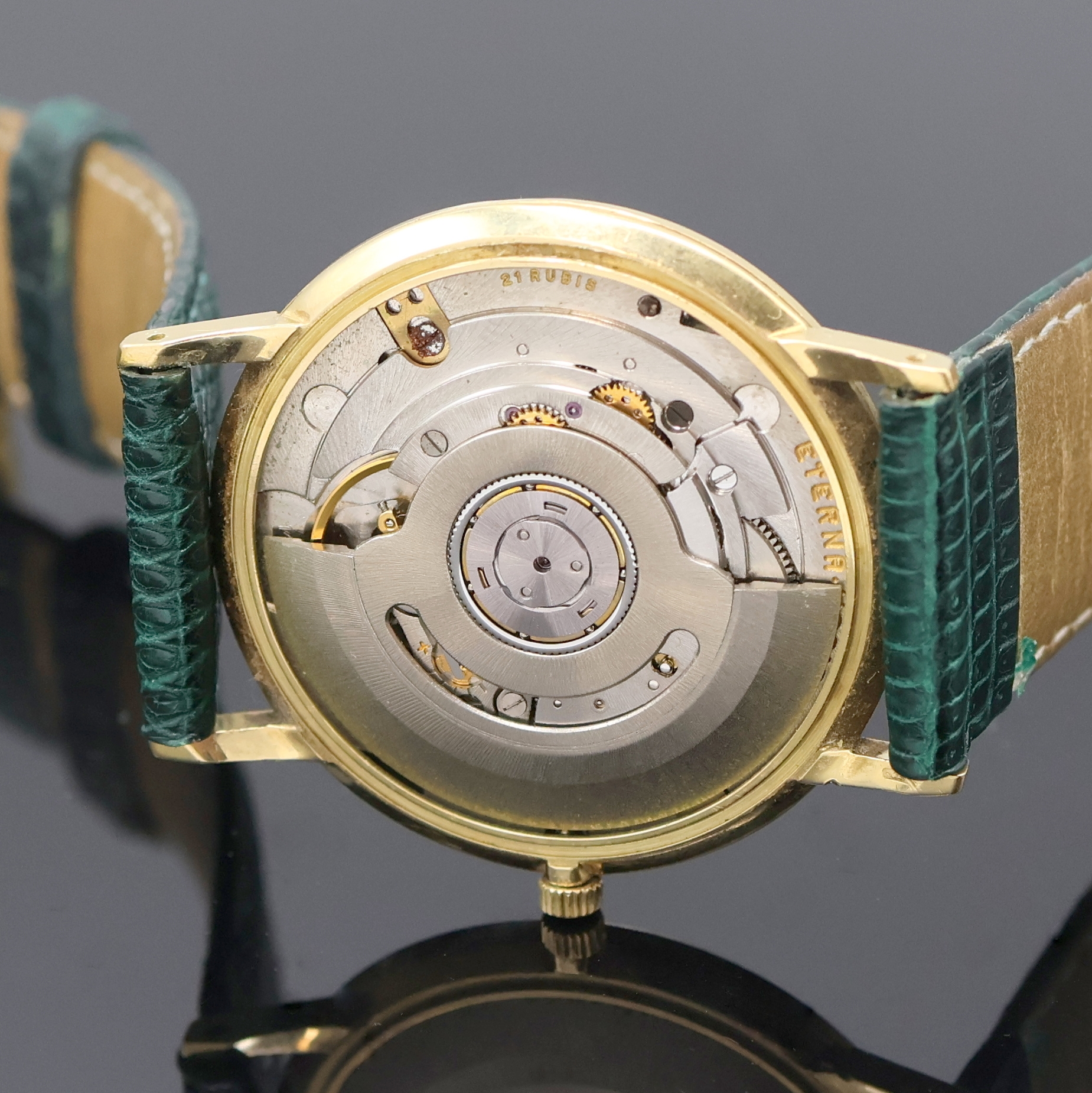 Detail f: ETERNA-MATIC Armbanduhr in GG 750/000, Schweiz um 1965, Automatik, Boden u. Glasrand aufgedr., silb. Zifferbl. teils berieben/pat., gold. Std.-Ind. ...