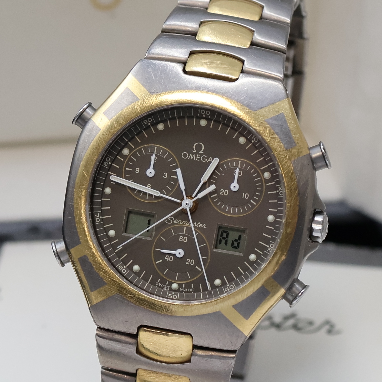 Detail a: OMEGA Armbandchronograph Seamaster Polaris 1/100 in Titan und Gold kombiniert Referenz 386.1231, Schweiz um 1989, quarz, mattiertes Geh. Gold ...