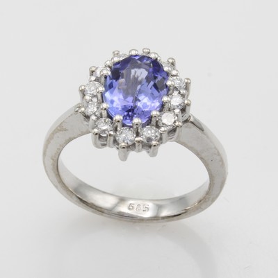 27040810a - Ring mit Tansanit und Diamanten, WG 585/000, ovaler Tansanit ca. 2 ct umgeben v. ...