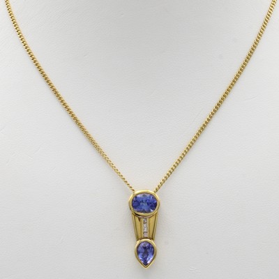 27040865a - Anhänger mit Tansaniten und Diamanten an Kette, GG 750/000, 2 Tansanite zus. ca. 2.54 ...