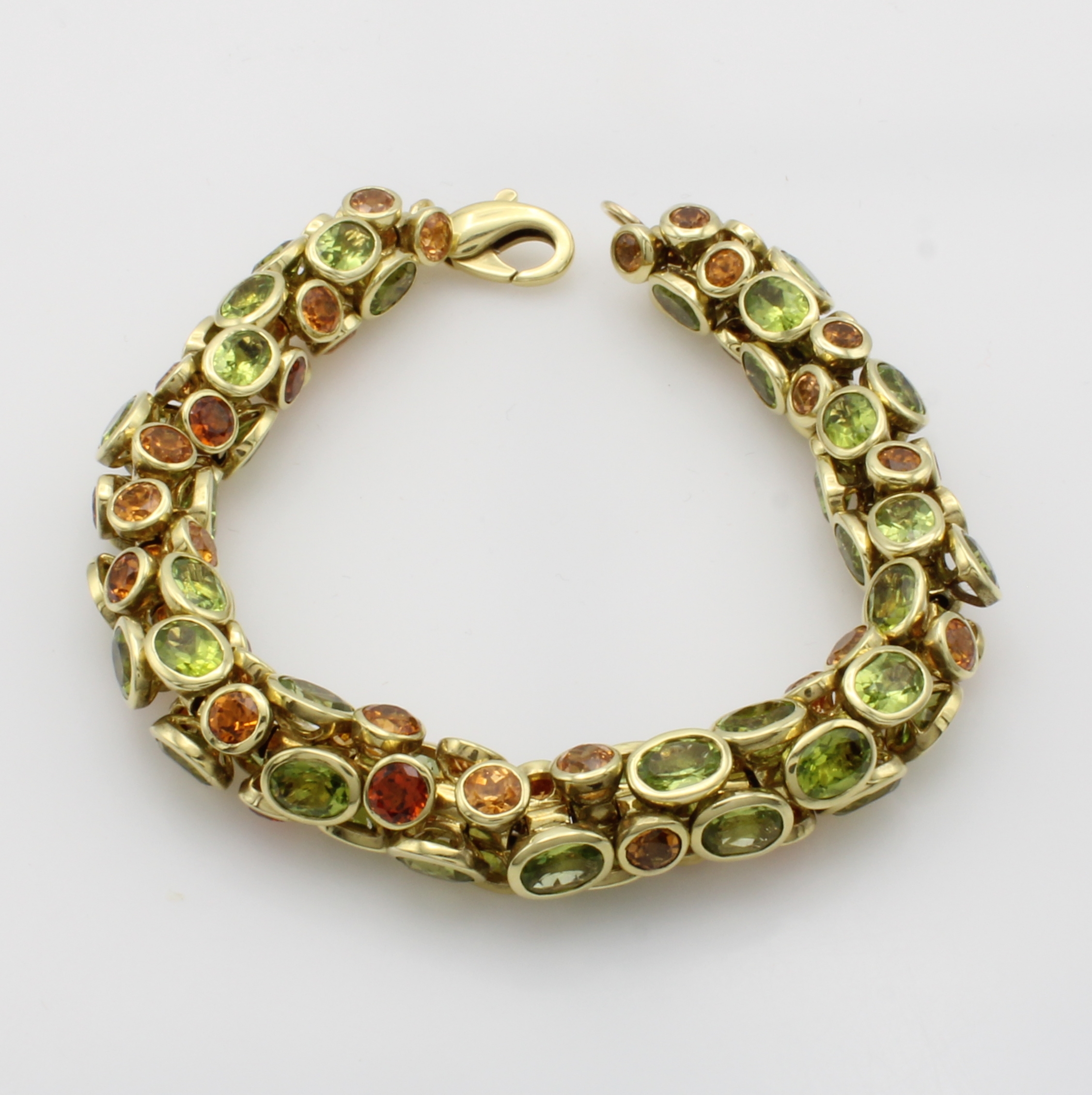 Image 27040998 - Armband mit Farbsteinen, GG 585/000, einzelne Elemente auf Kette aufgezogen, Peridots ...