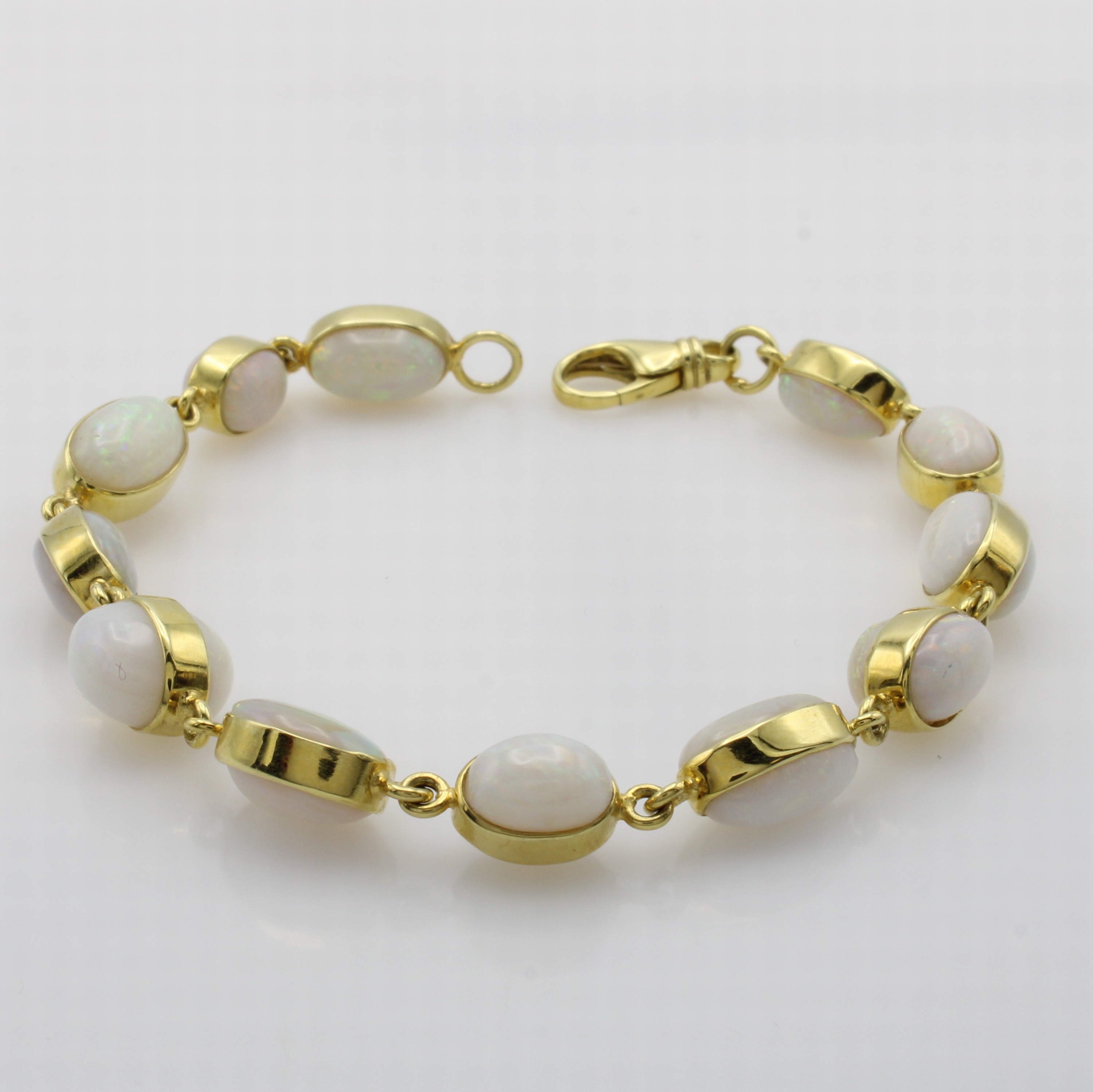 Image 27041051 - Armband mit Opalen, GG 585/000, ovale Opale zus. ca. 32.5 ct, Karabinerschl., L. ca. 21 ...