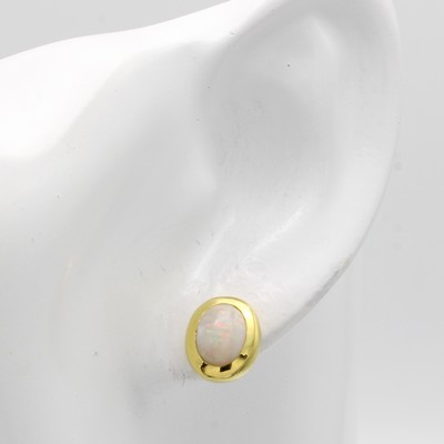 27041047a - Paar Ohrstecker mit Opalen, GG 585/000, 2 ovale Opale in breiten, glatten Fassungen zus. ...