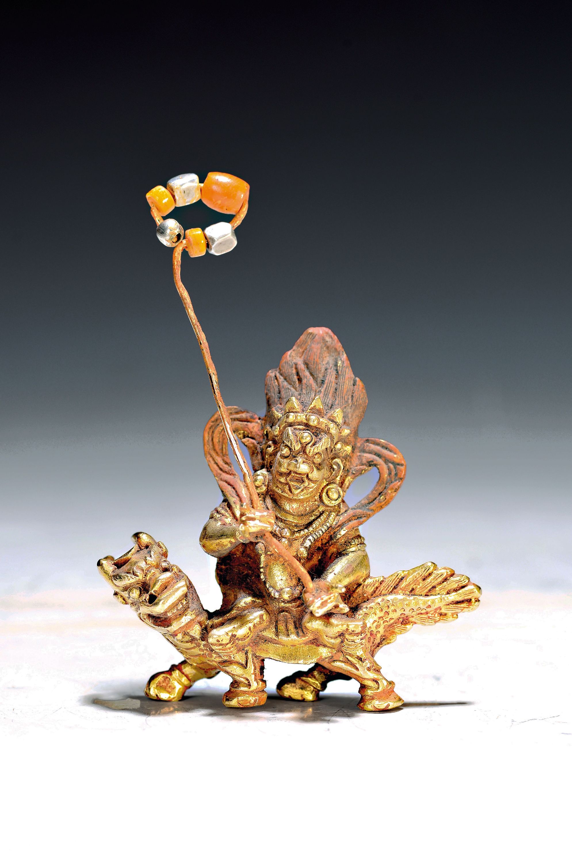 Image 27041147 - Bronzefigur, Mahakala auf Drachen, Mongolei, Bronze, z.T. bemalt, mit Fahne, ca. 9 x 7 ...