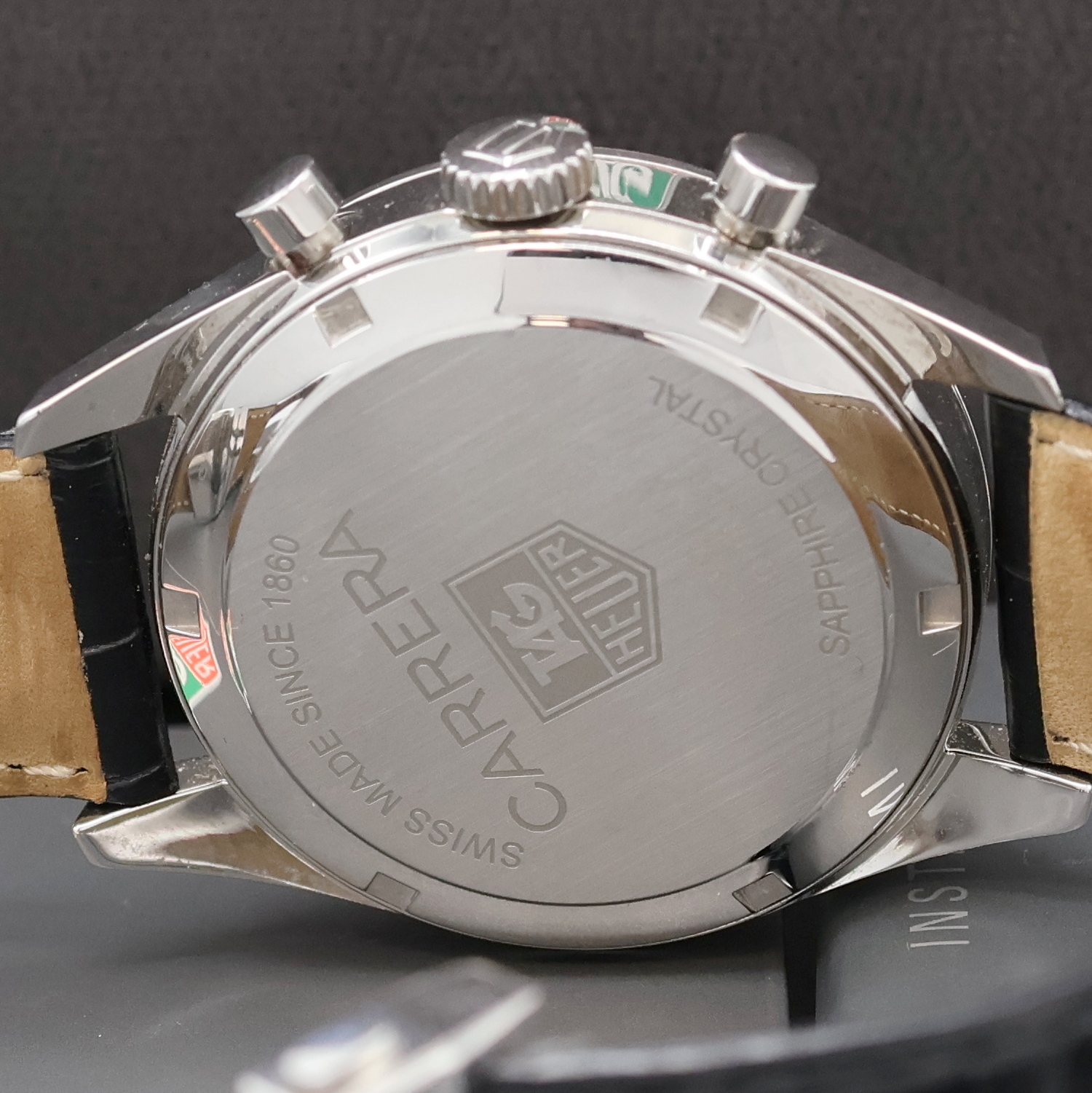 Detail e: TAG HEUER Armbandchronograph Carrera Referenz CV2111, Automatik, Edelstahlgeh. inkl. orig. Lederband m. orig. Faltschl., Boden verschr., schwarzes ...