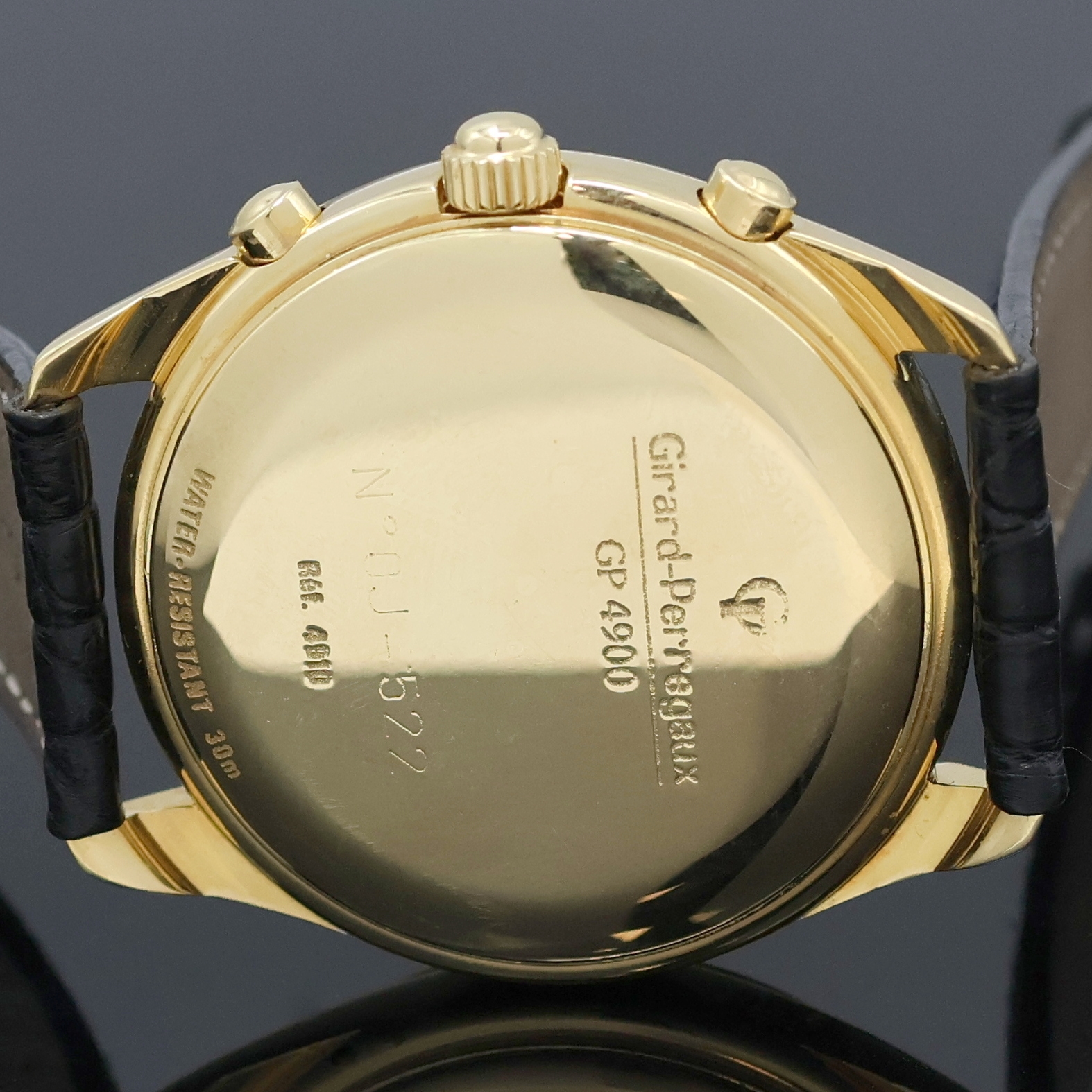 Detail e: GIRARD PERREGAUX Armbandchronograph in GG 750/000 Referenz 4910, Automatik, Schweiz um 1990, 3-teil. Geh. inkl. orig. Lederband mit orig. GG 750/000 ...