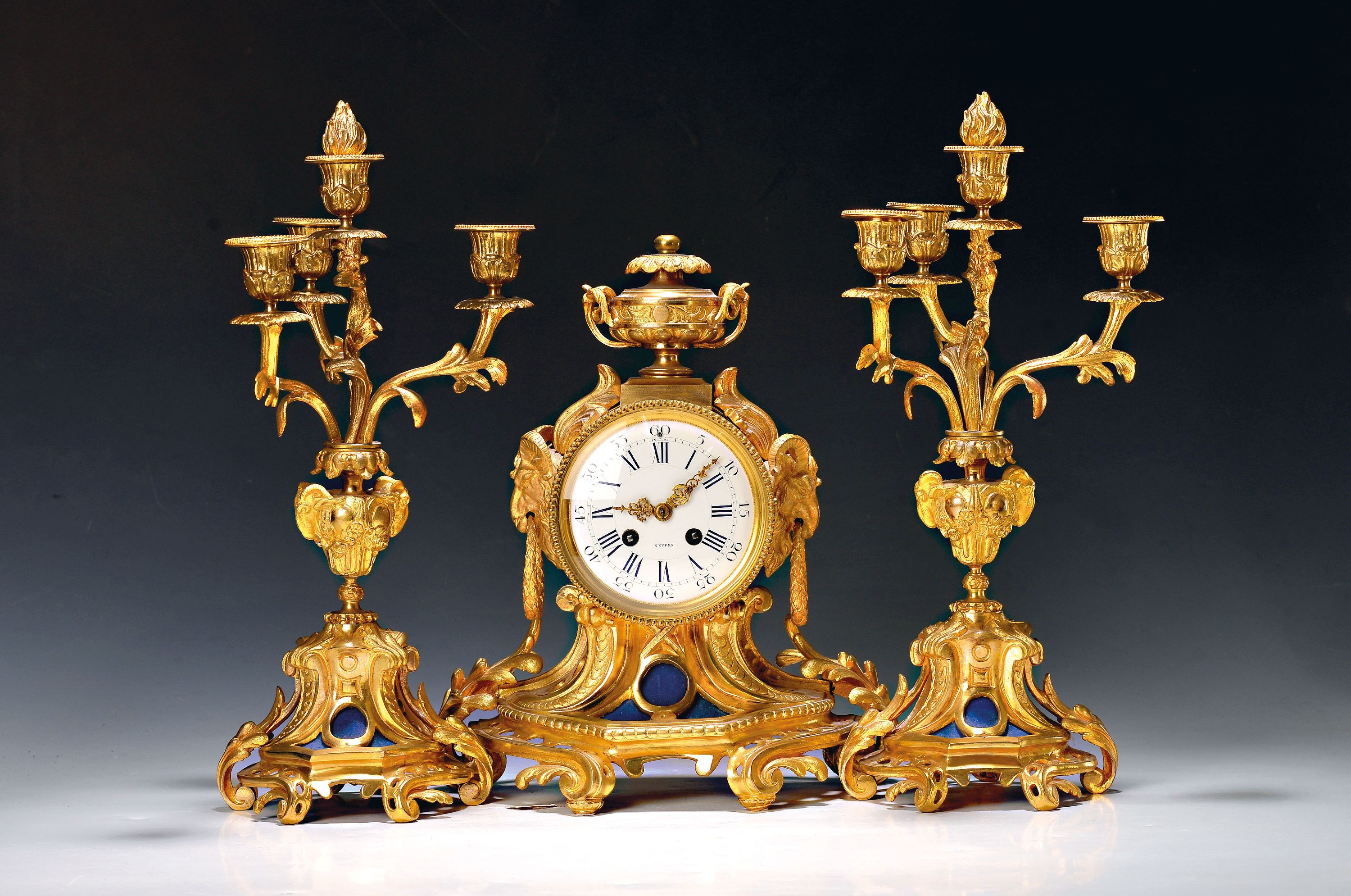 Image 27041603 - Pendulum with two candlesticks, France, around1900, decorated bronze with old gilding, ...