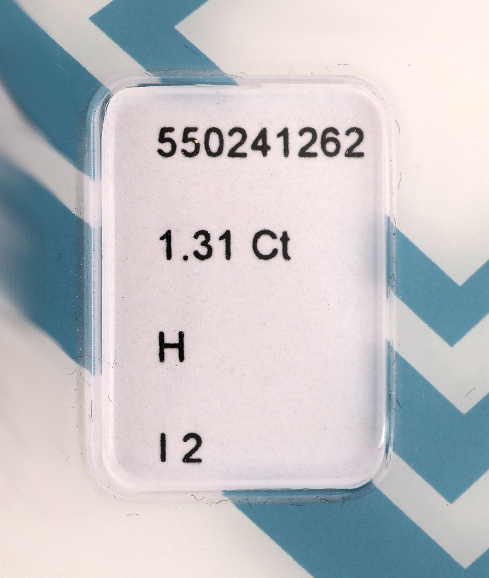 Detail a: Loser Brillant 1.31 ct Weiß(H)/p2, verschweißt, IGI-Expertise