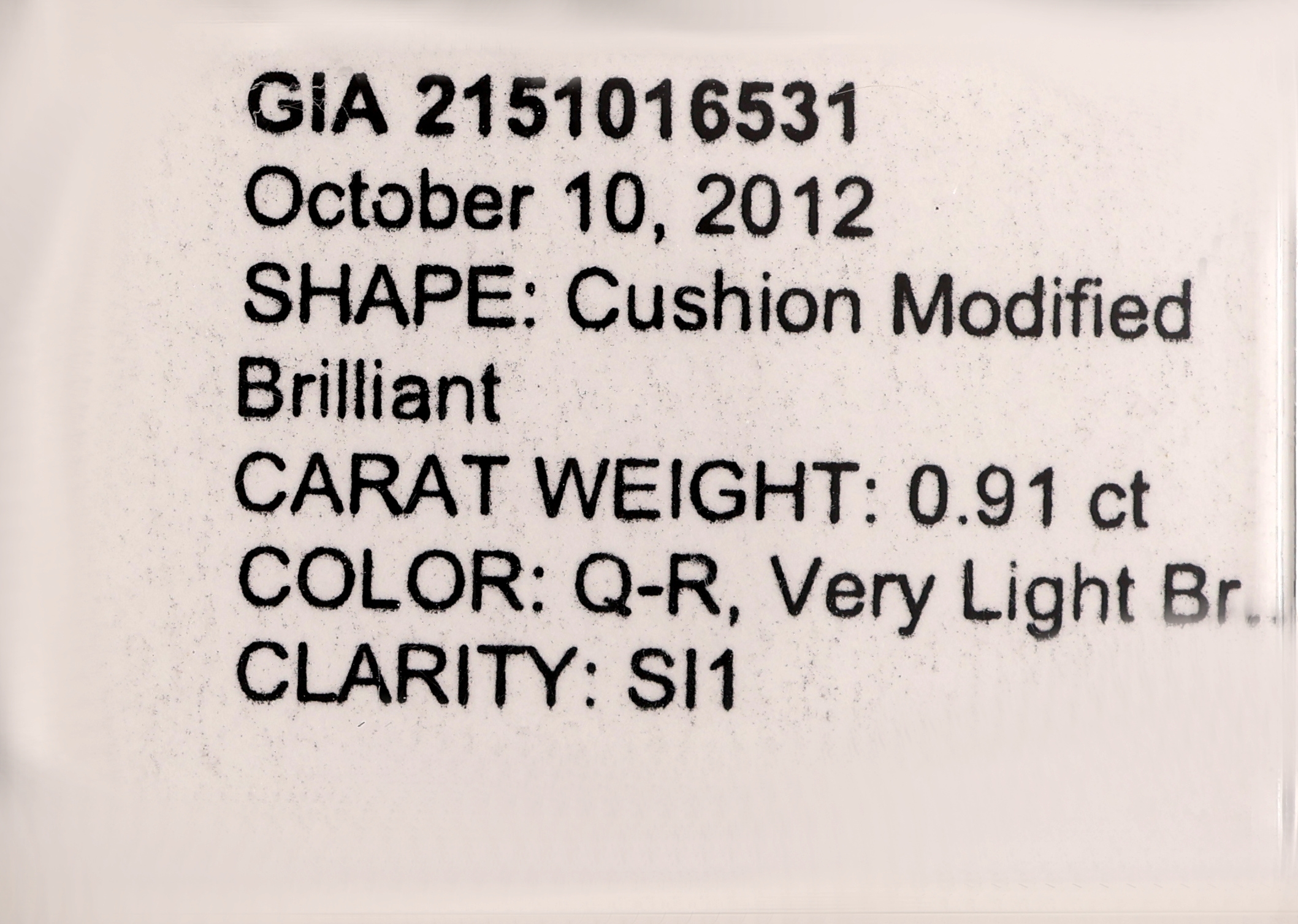 Detail a: Loser Diamant im modifizierten Kissenschliff 0.91 ct Very light Brown (Q-R)/si1, verschweißt, GIA-Expertise